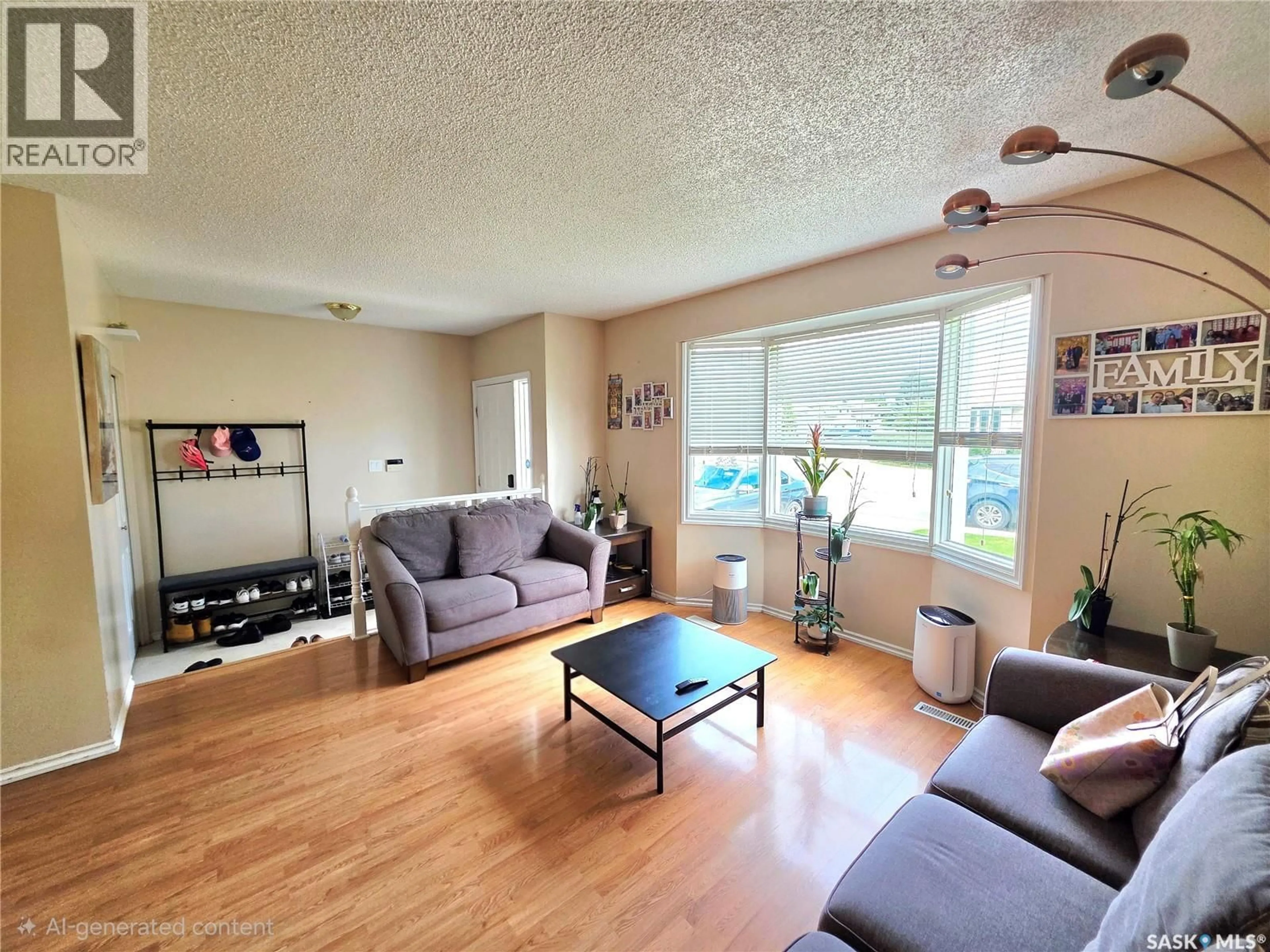 Living room with furniture, unknown for 155 CARTER CRESCENT, Saskatoon Saskatchewan S7L7K4