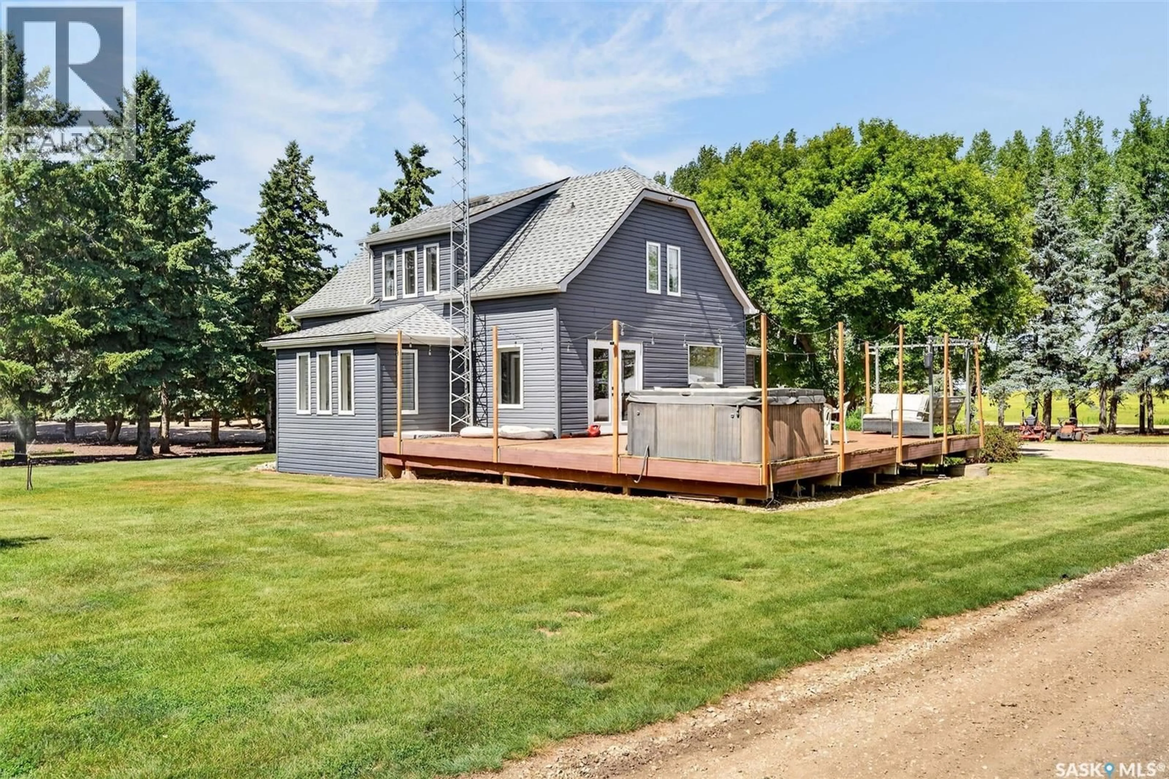 Home with vinyl exterior material, street for WILLIAMS ACREAGE, Wolverine Rm No. 340 Saskatchewan S0K2M0