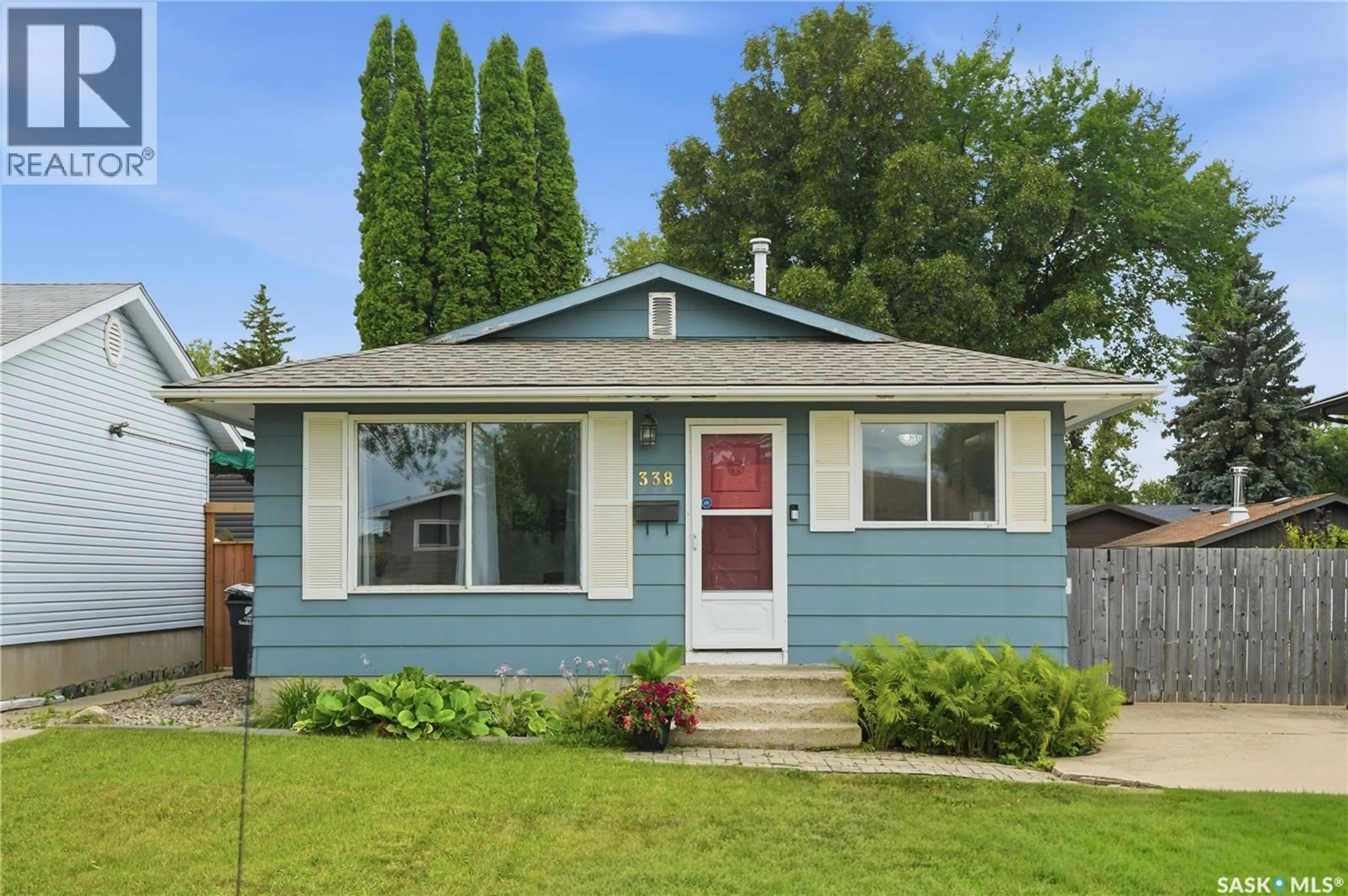 Home with vinyl exterior material, street for 338 BROCK CRESCENT, Saskatoon Saskatchewan S7H4N5