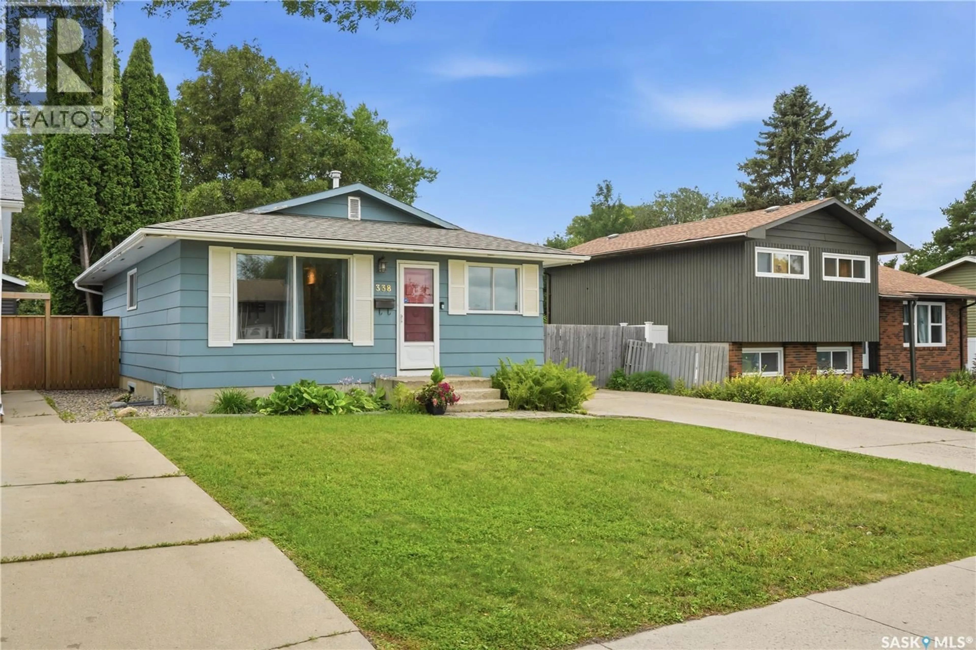 Home with vinyl exterior material, street for 338 BROCK CRESCENT, Saskatoon Saskatchewan S7H4N5