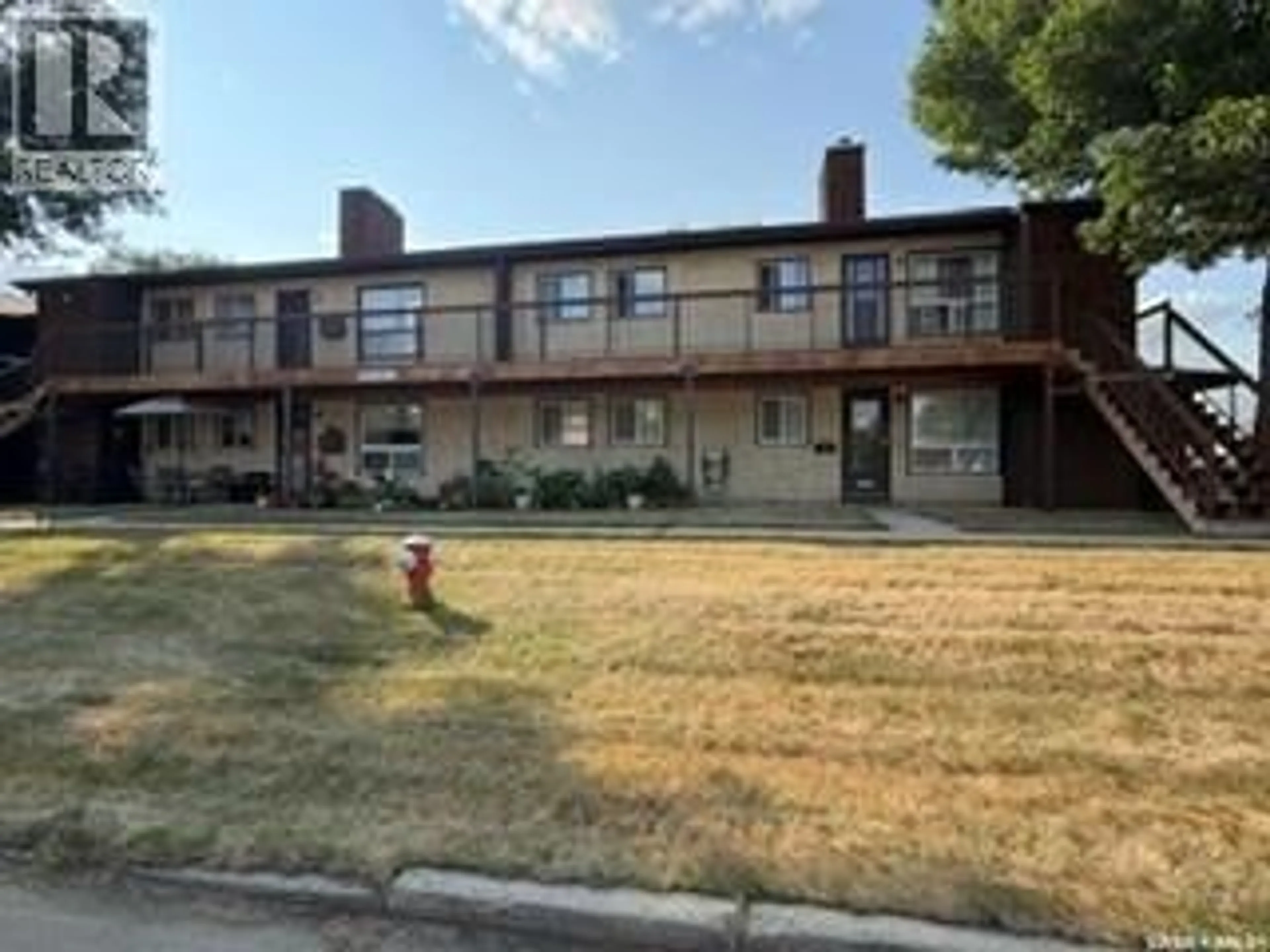 A pic from outside/outdoor area/front of a property/back of a property/a pic from drone, unknown for 101C - 1350 GORDON ROAD, Moose Jaw Saskatchewan S6H7R9