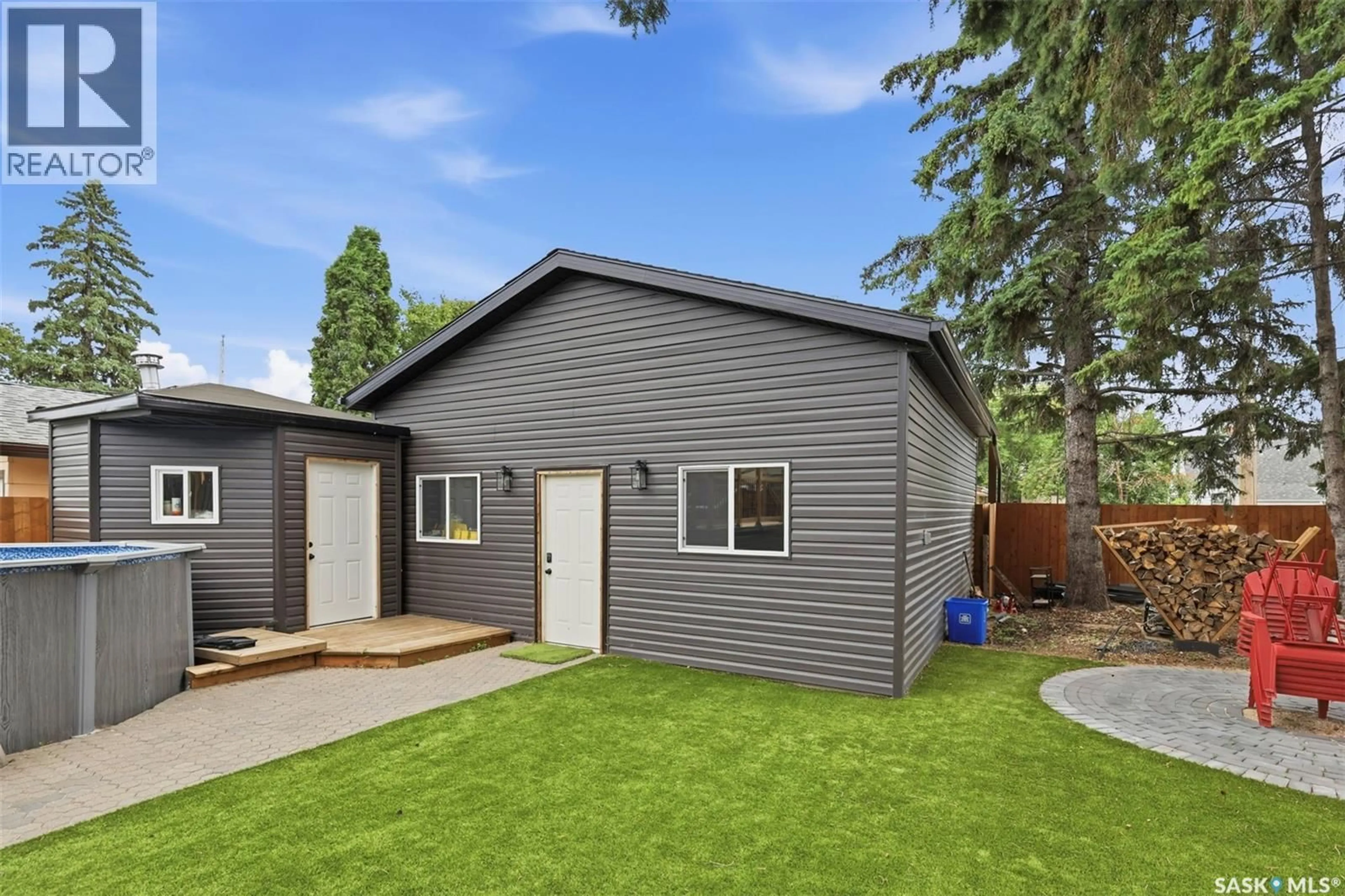 Home with vinyl exterior material, street for 207 113TH STREET, Saskatoon Saskatchewan S7N1W1