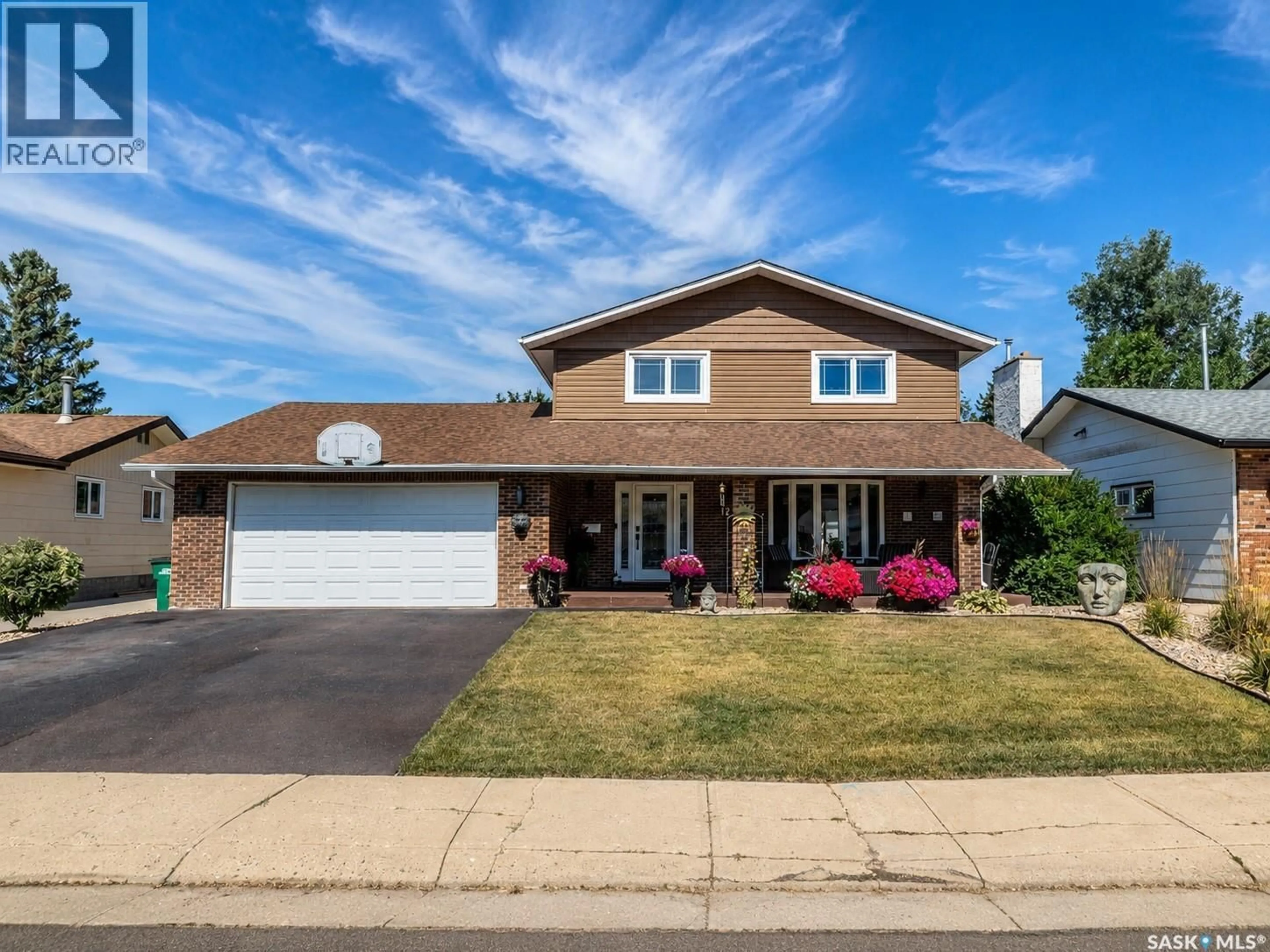 Home with vinyl exterior material, street for 1259 MAYBERY CRESCENT, Moose Jaw Saskatchewan S6H6X7
