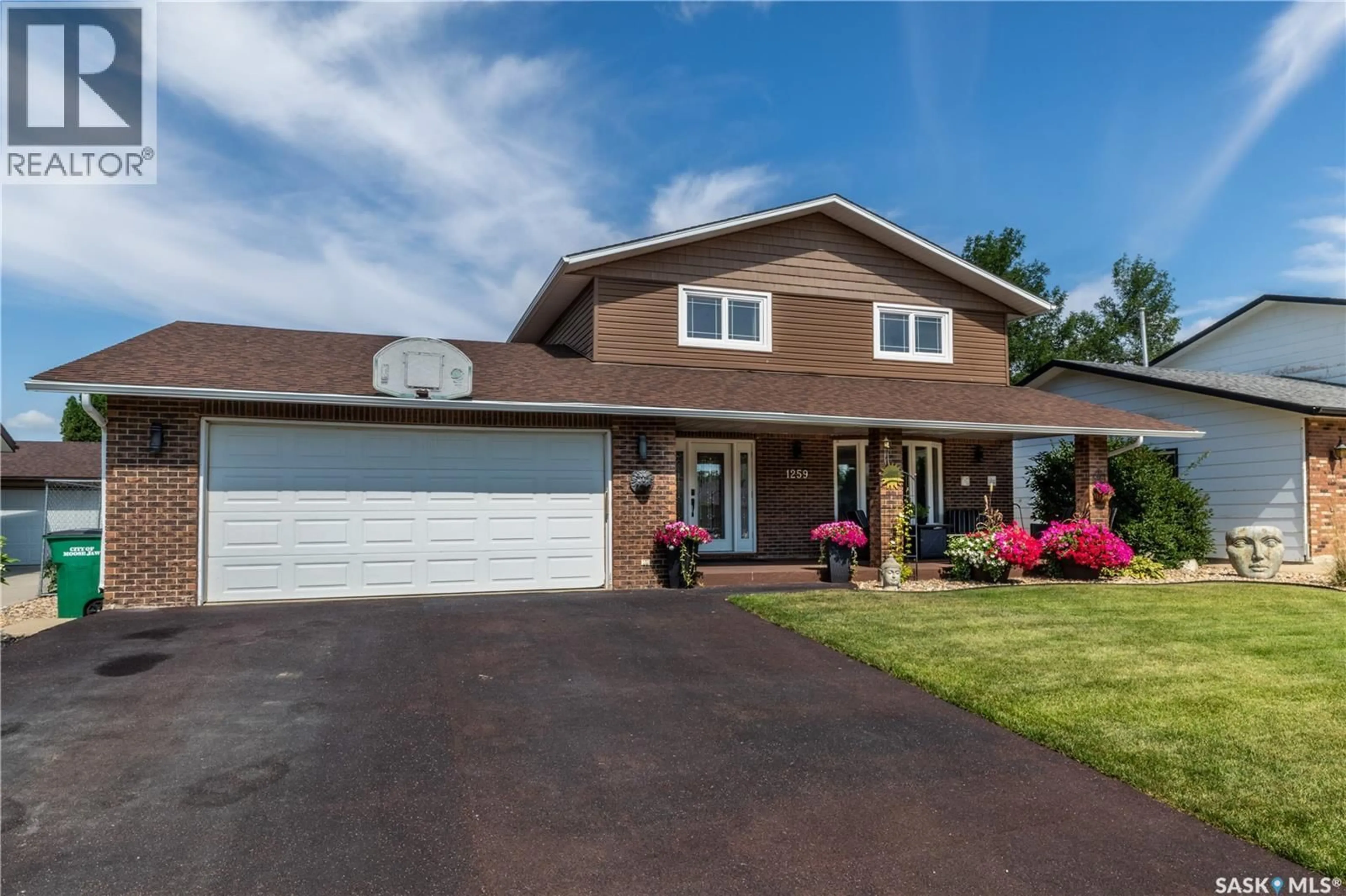 Home with vinyl exterior material, street for 1259 MAYBERY CRESCENT, Moose Jaw Saskatchewan S6H6X7
