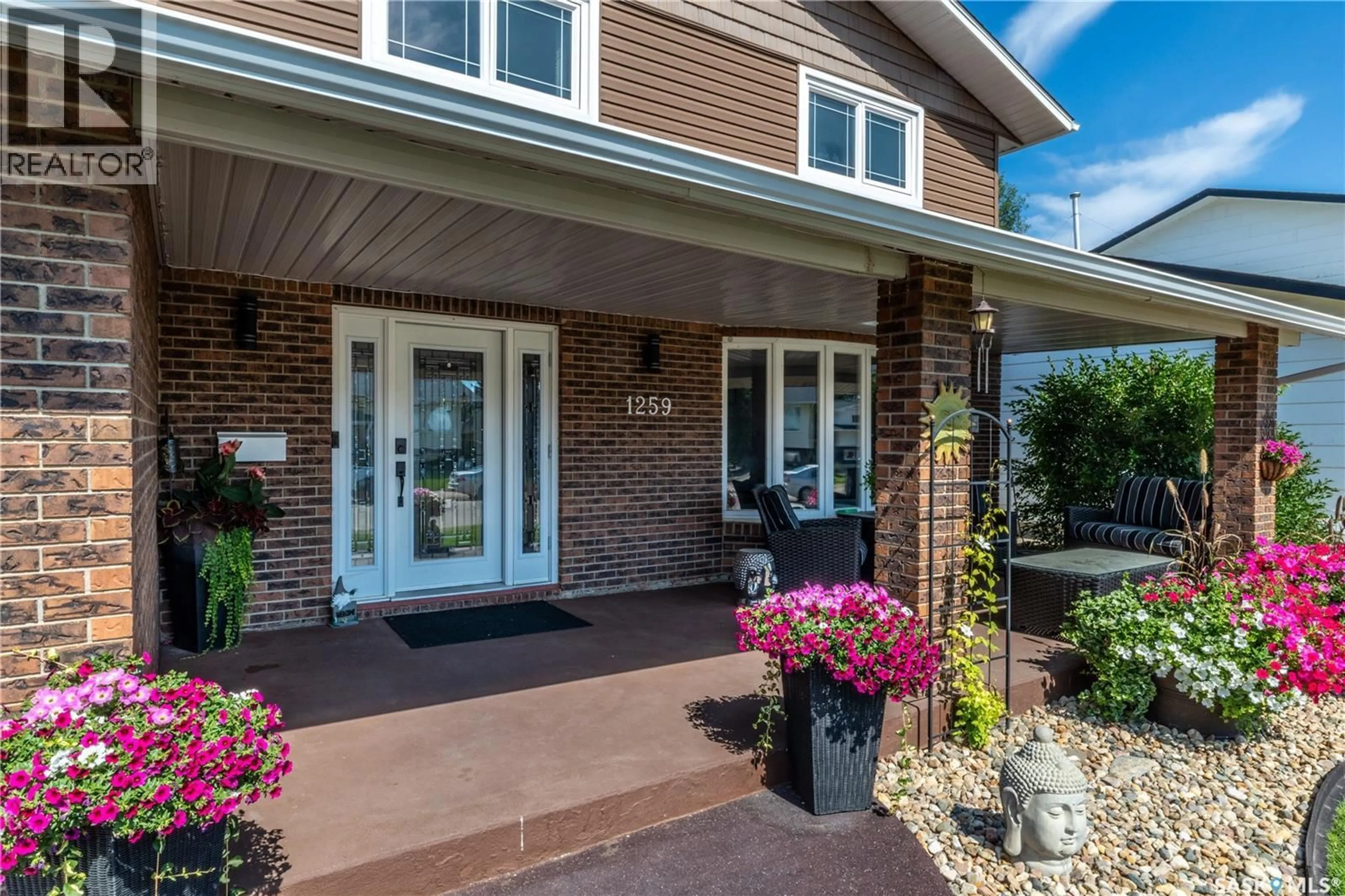 Home with brick exterior material, street for 1259 MAYBERY CRESCENT, Moose Jaw Saskatchewan S6H6X7