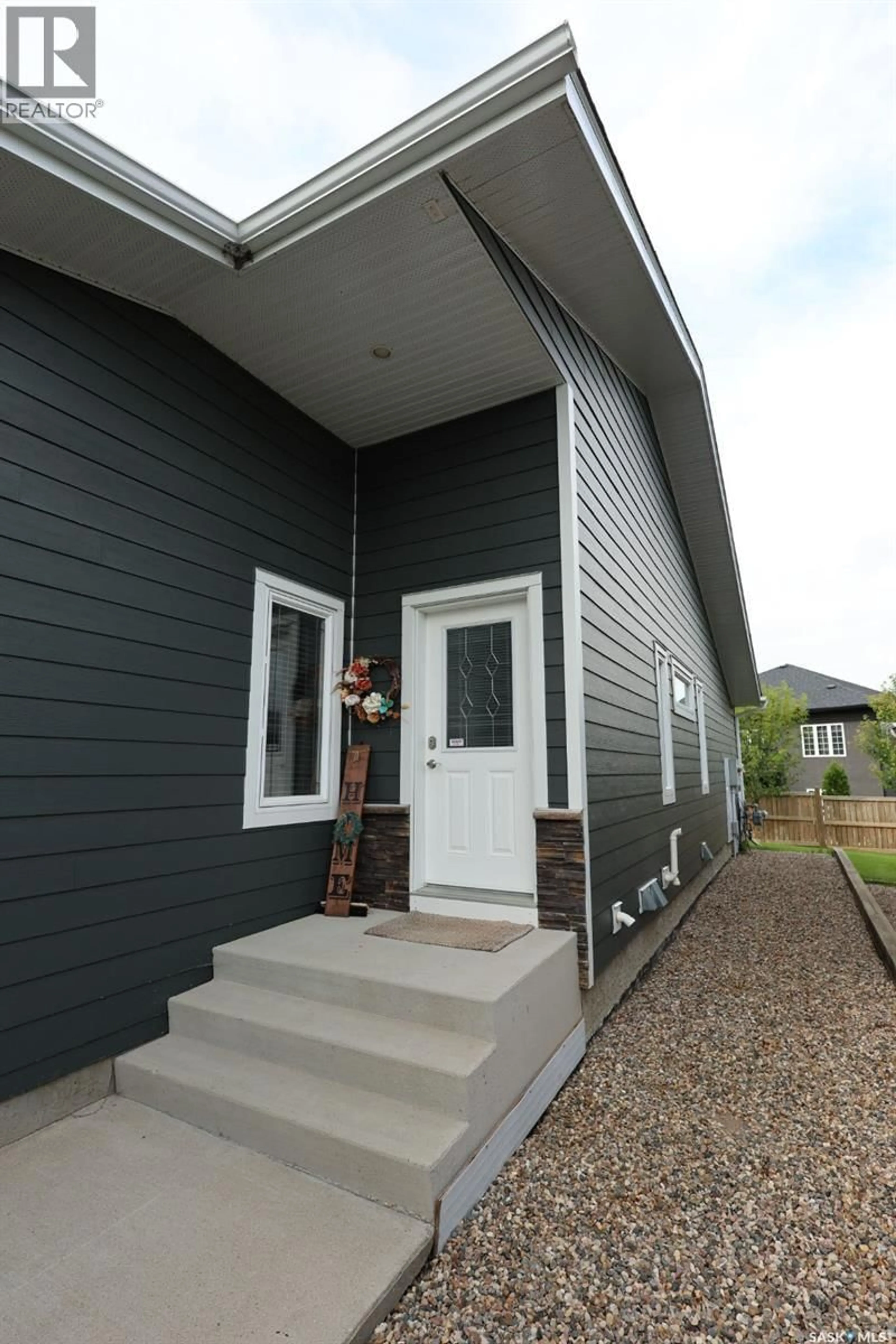 Home with vinyl exterior material, street for 1851 - 309 PEDERSON DRIVE, Prince Albert Saskatchewan S6X0B2
