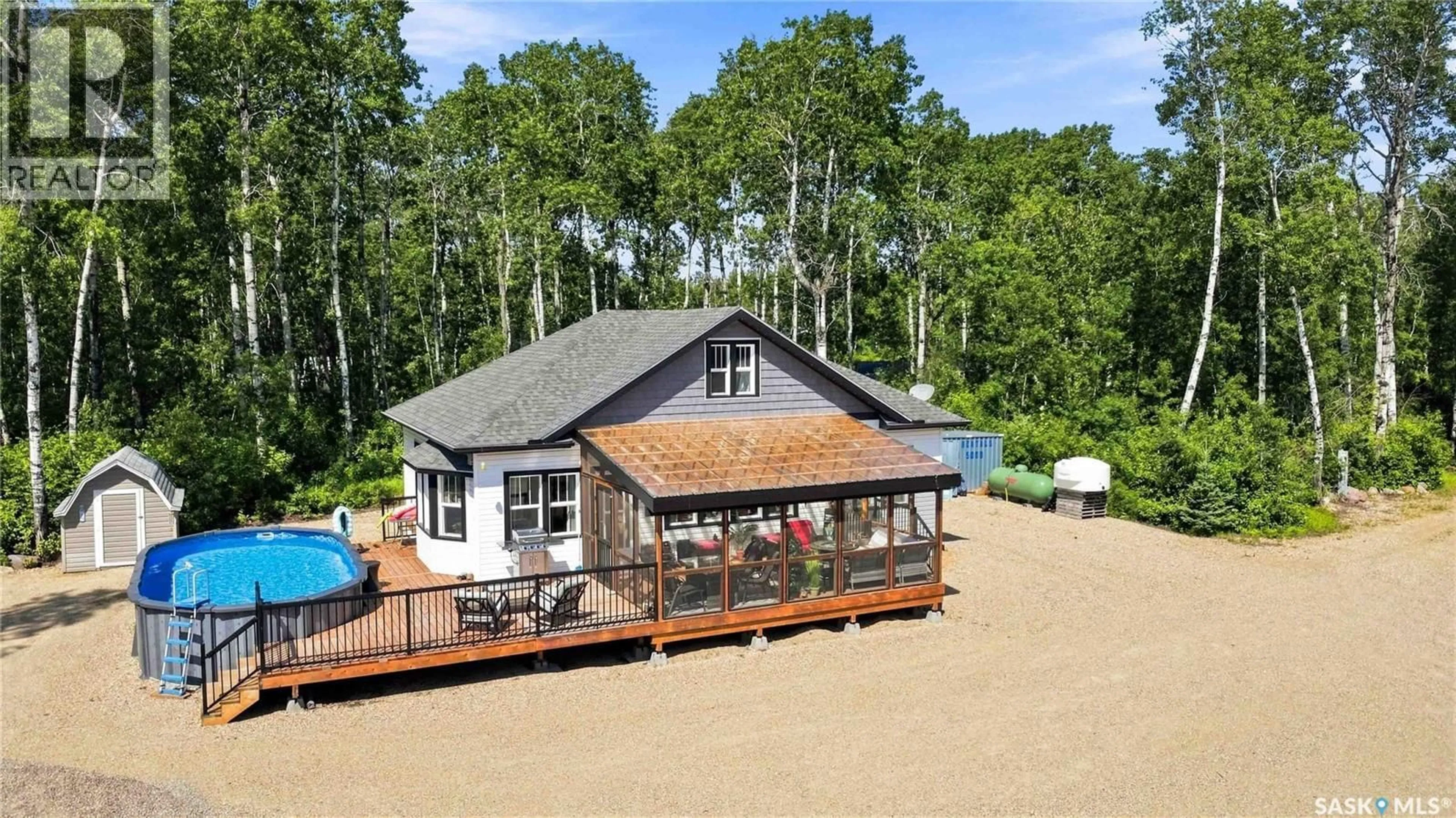 A pic from outside/outdoor area/front of a property/back of a property/a pic from drone, water/lake/river/ocean view for 501 CONER HEIGHTS, Barrier Lake Saskatchewan S0E0B0