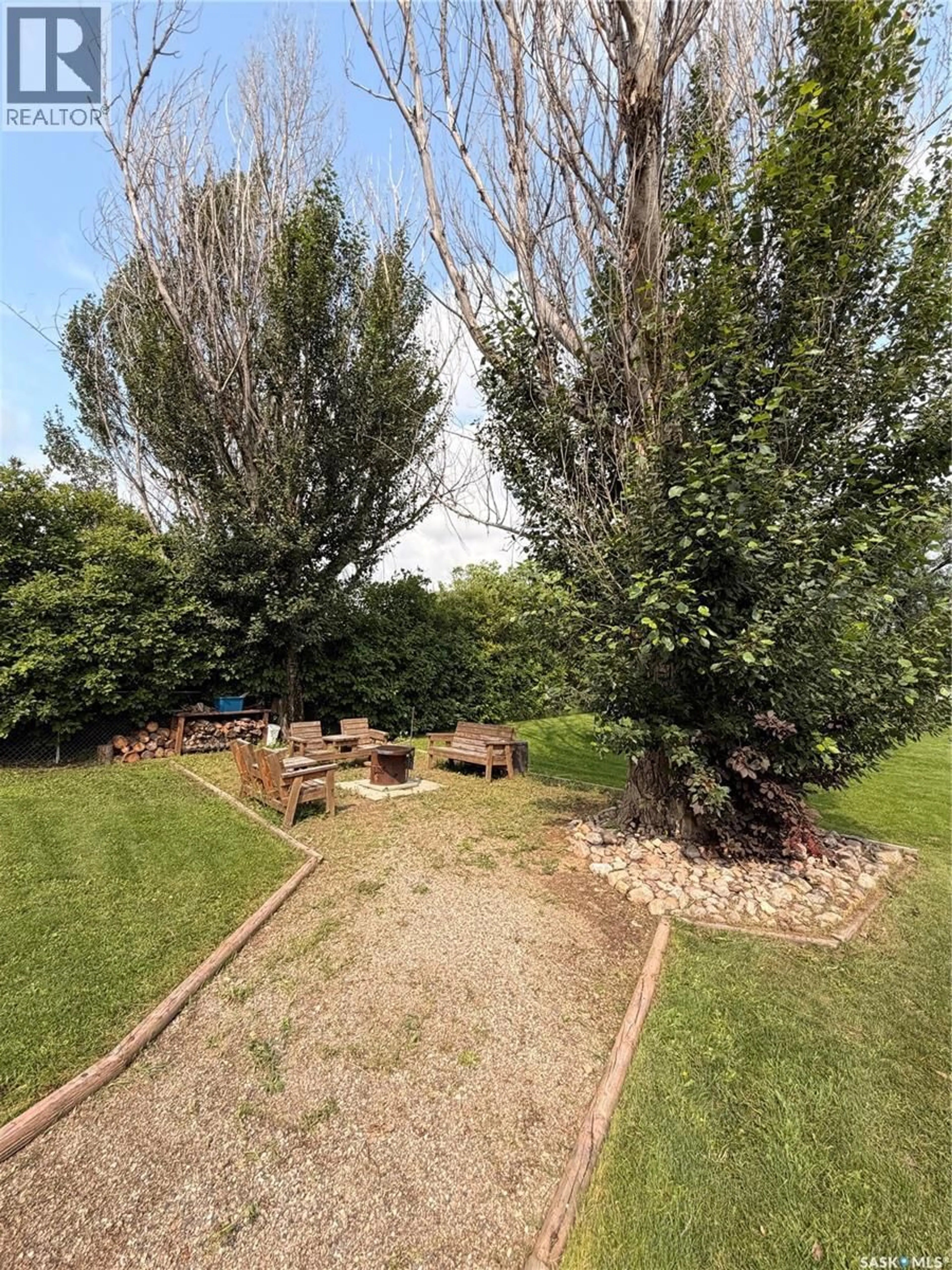 A pic from outside/outdoor area/front of a property/back of a property/a pic from drone, forest/trees view for 415 9TH AVENUE, Meadow Lake Saskatchewan S9X1H1