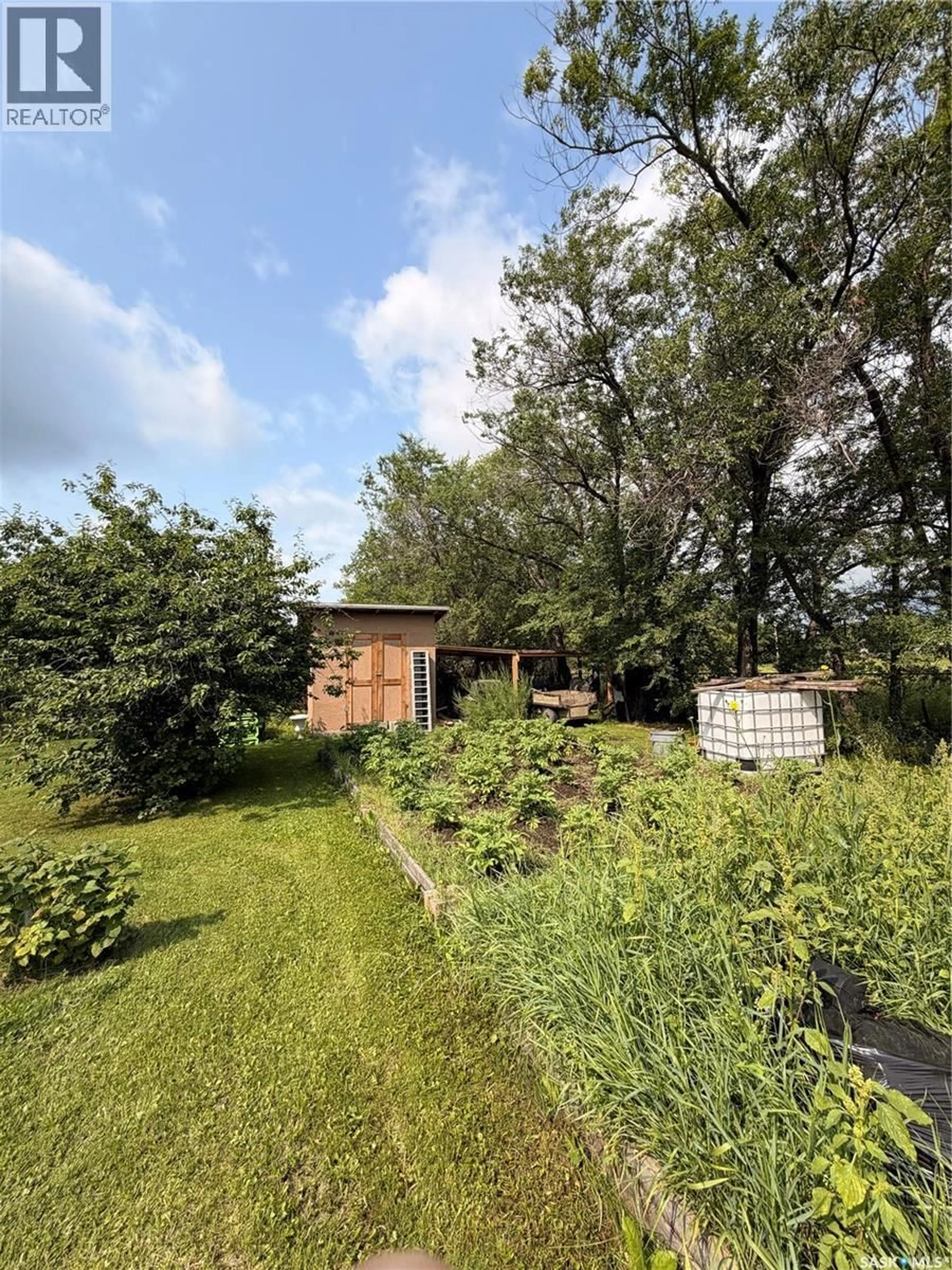 A pic from outside/outdoor area/front of a property/back of a property/a pic from drone, forest/trees view for 415 9TH AVENUE, Meadow Lake Saskatchewan S9X1H1
