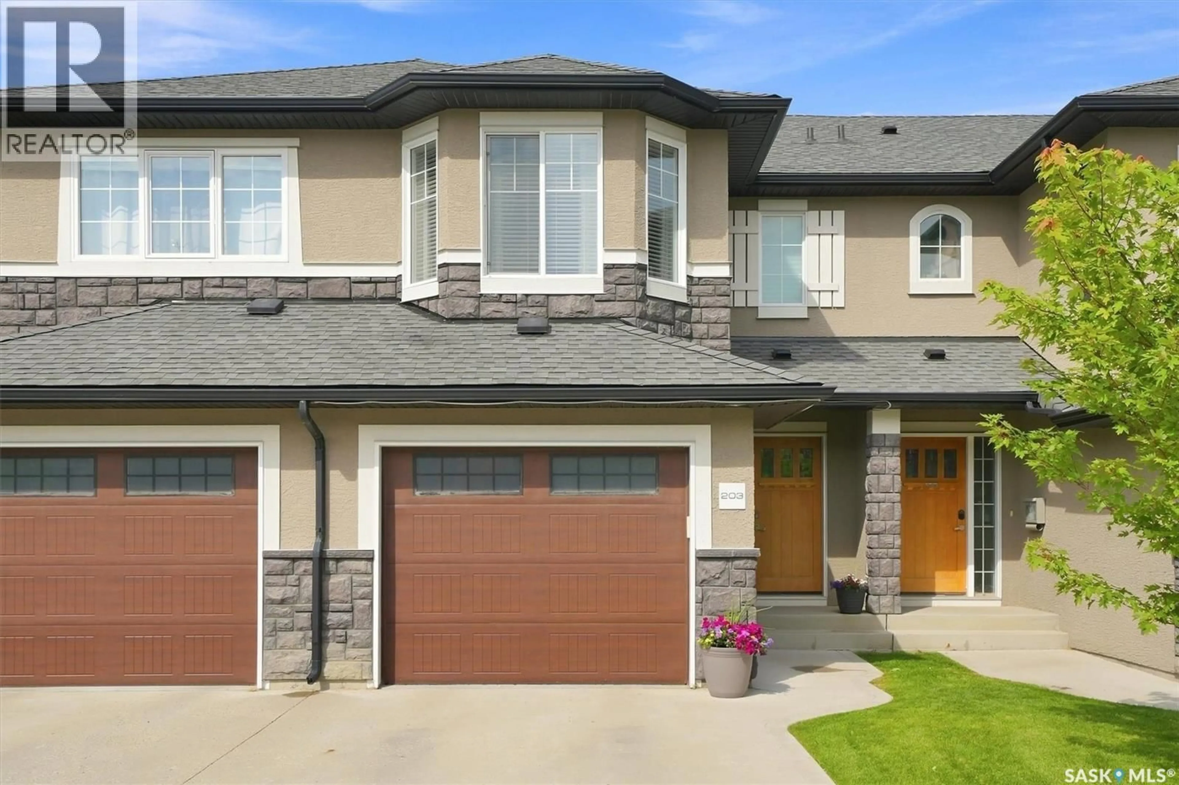 Home with brick exterior material, street for 203 - 2007 POHORECKY CRESCENT, Saskatoon Saskatchewan S7W0V3