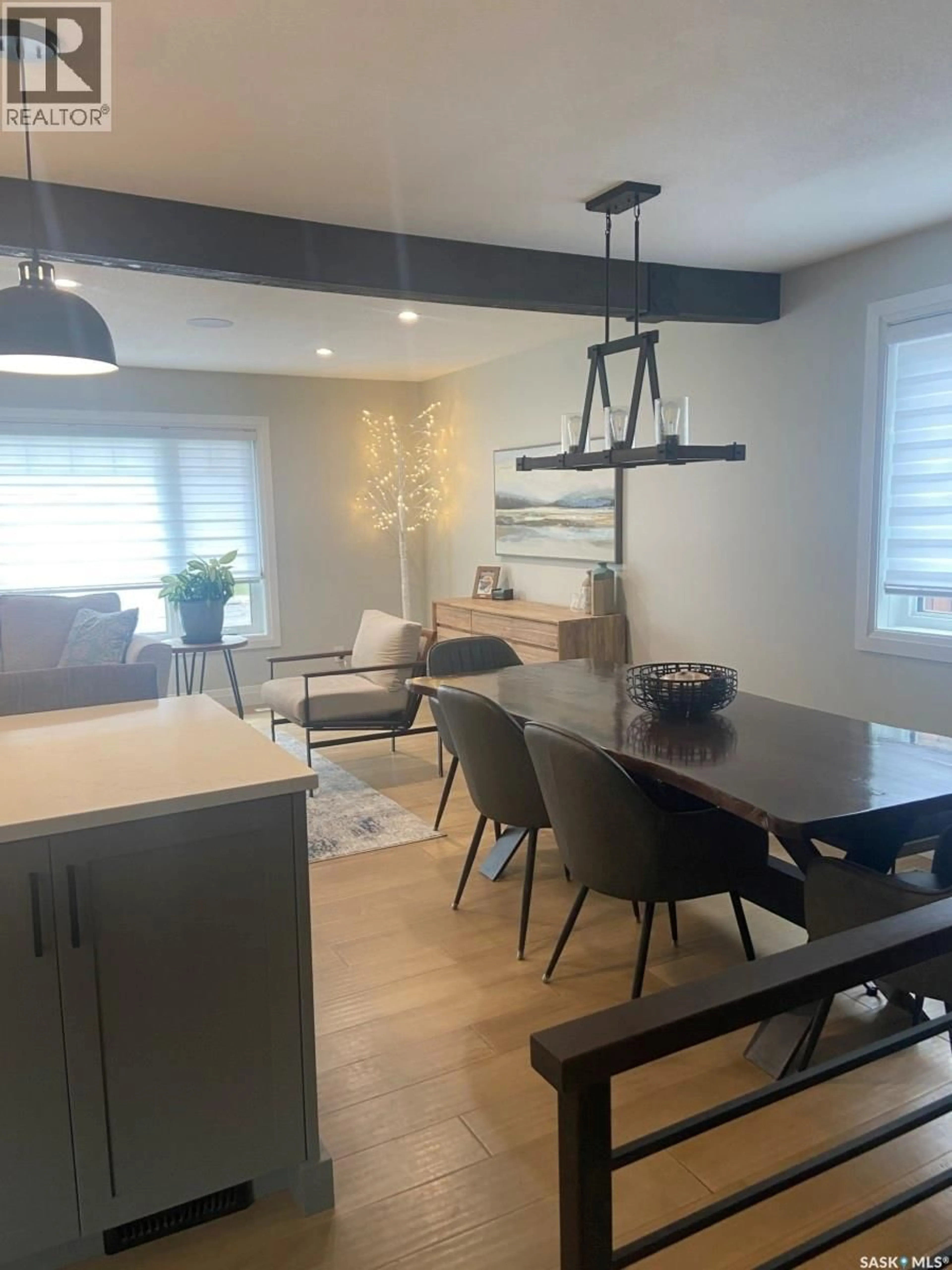 Open concept kitchen, wood/laminate floor for 116 MIDDLETON CRESCENT, Saskatoon Saskatchewan S7J2W4