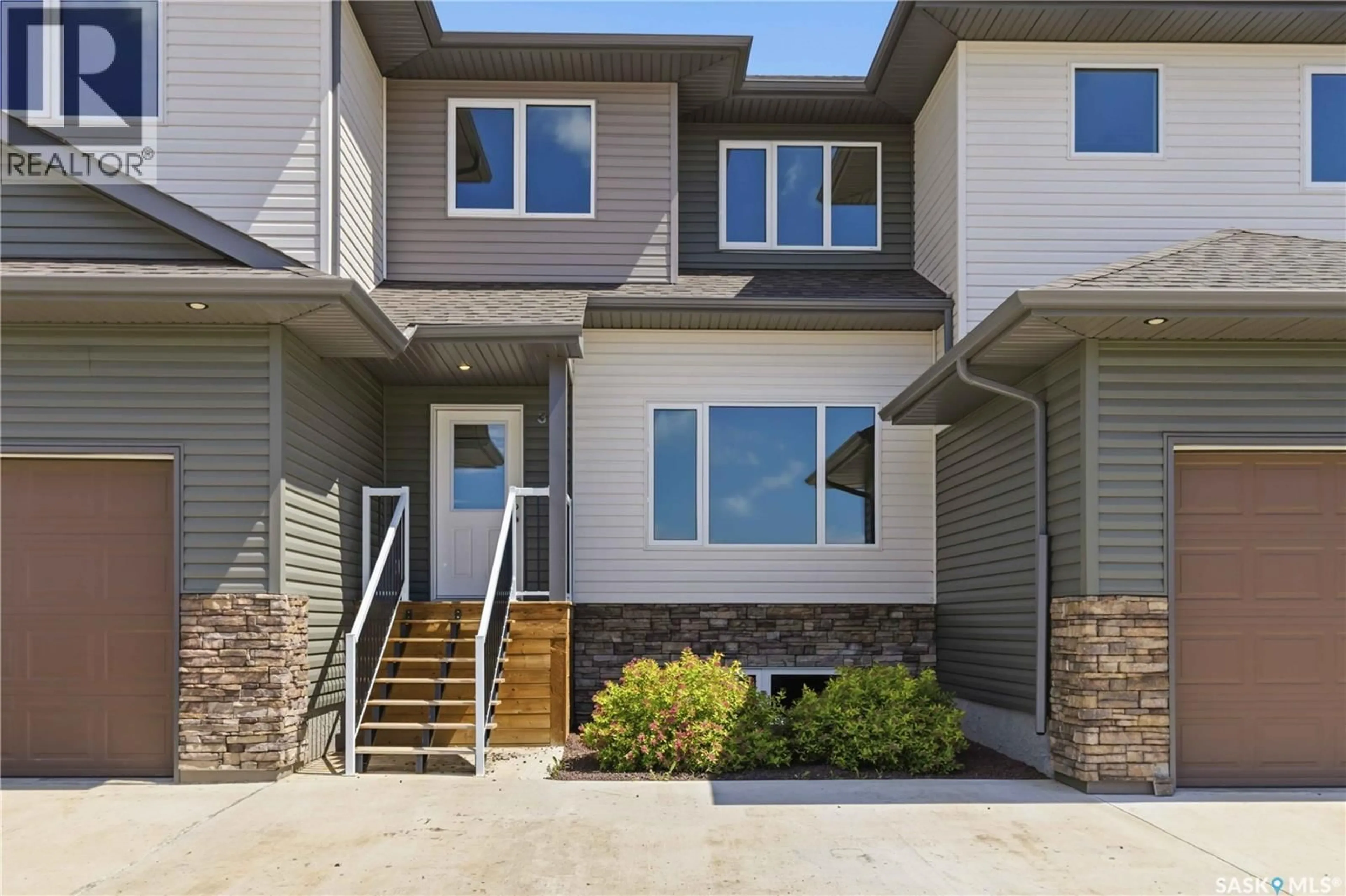 Home with vinyl exterior material, street for 301 - 32 CENTENNIAL ROAD, Hague Saskatchewan S0K1X0