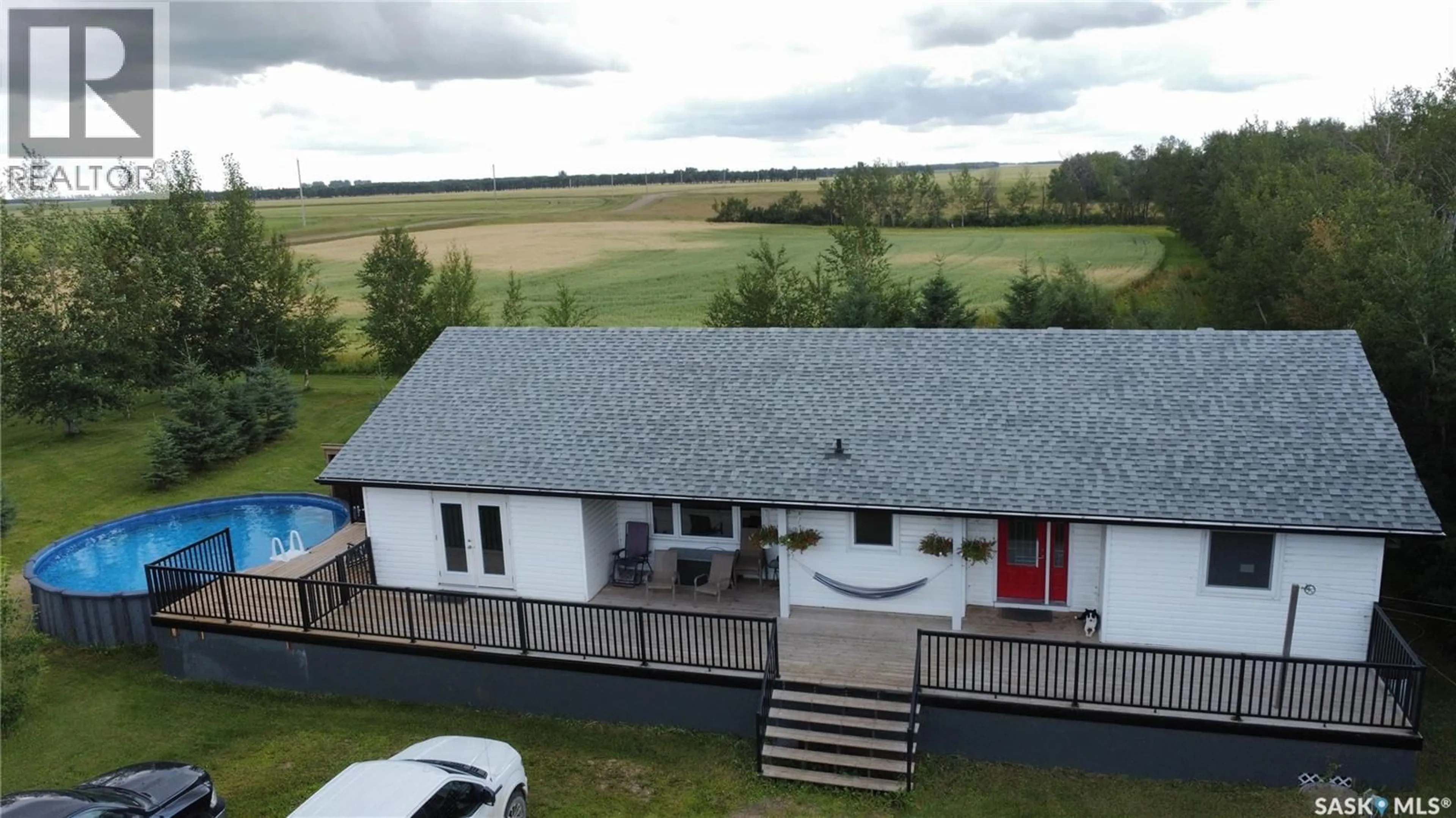 A pic from outside/outdoor area/front of a property/back of a property/a pic from drone, building for GABRIEL BRIDGE ACREAGE, Fish Creek Rm No. 402 Saskatchewan S0K4P0