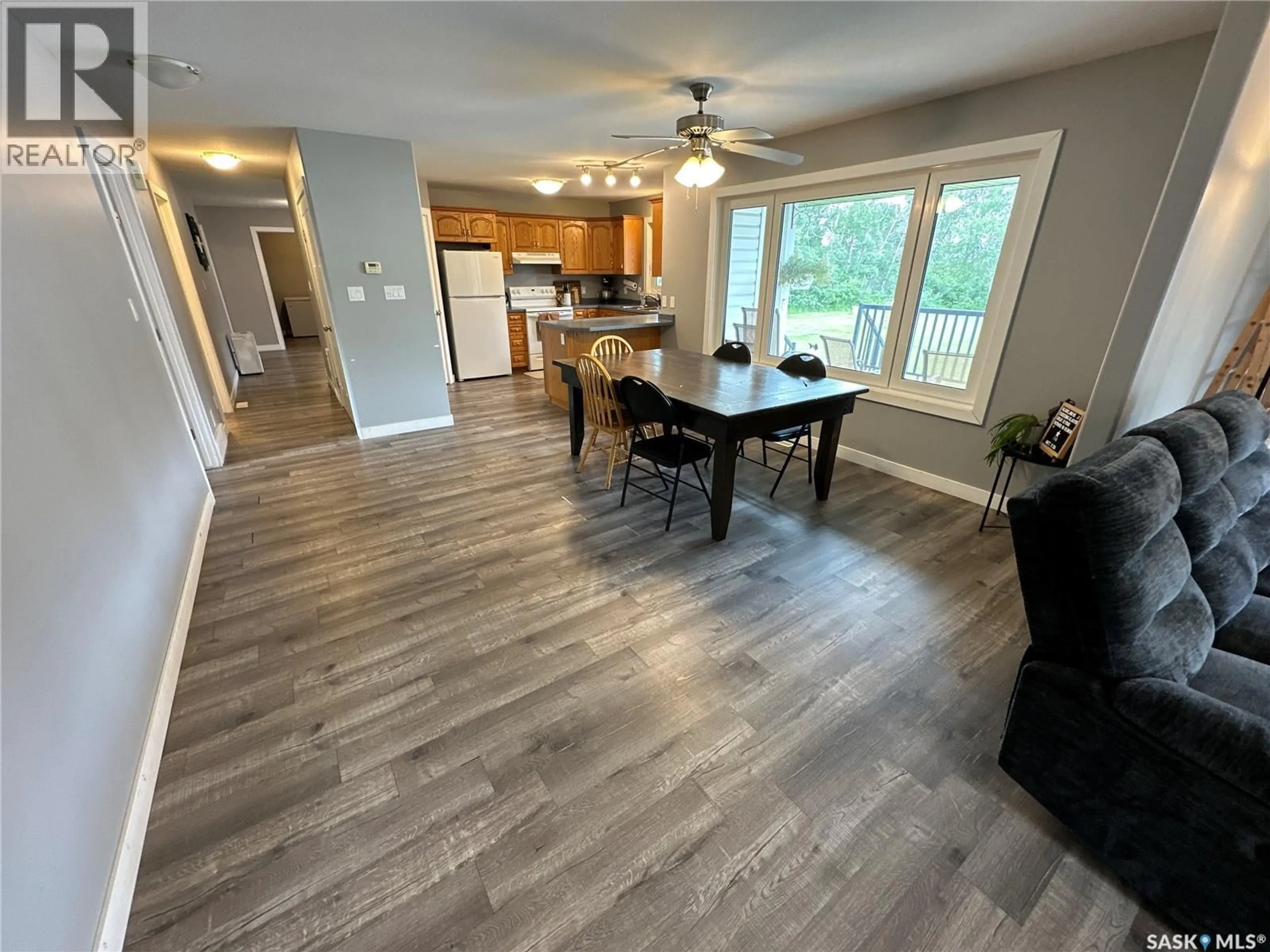 Open concept kitchen, wood/laminate floor for GABRIEL BRIDGE ACREAGE, Fish Creek Rm No. 402 Saskatchewan S0K4P0
