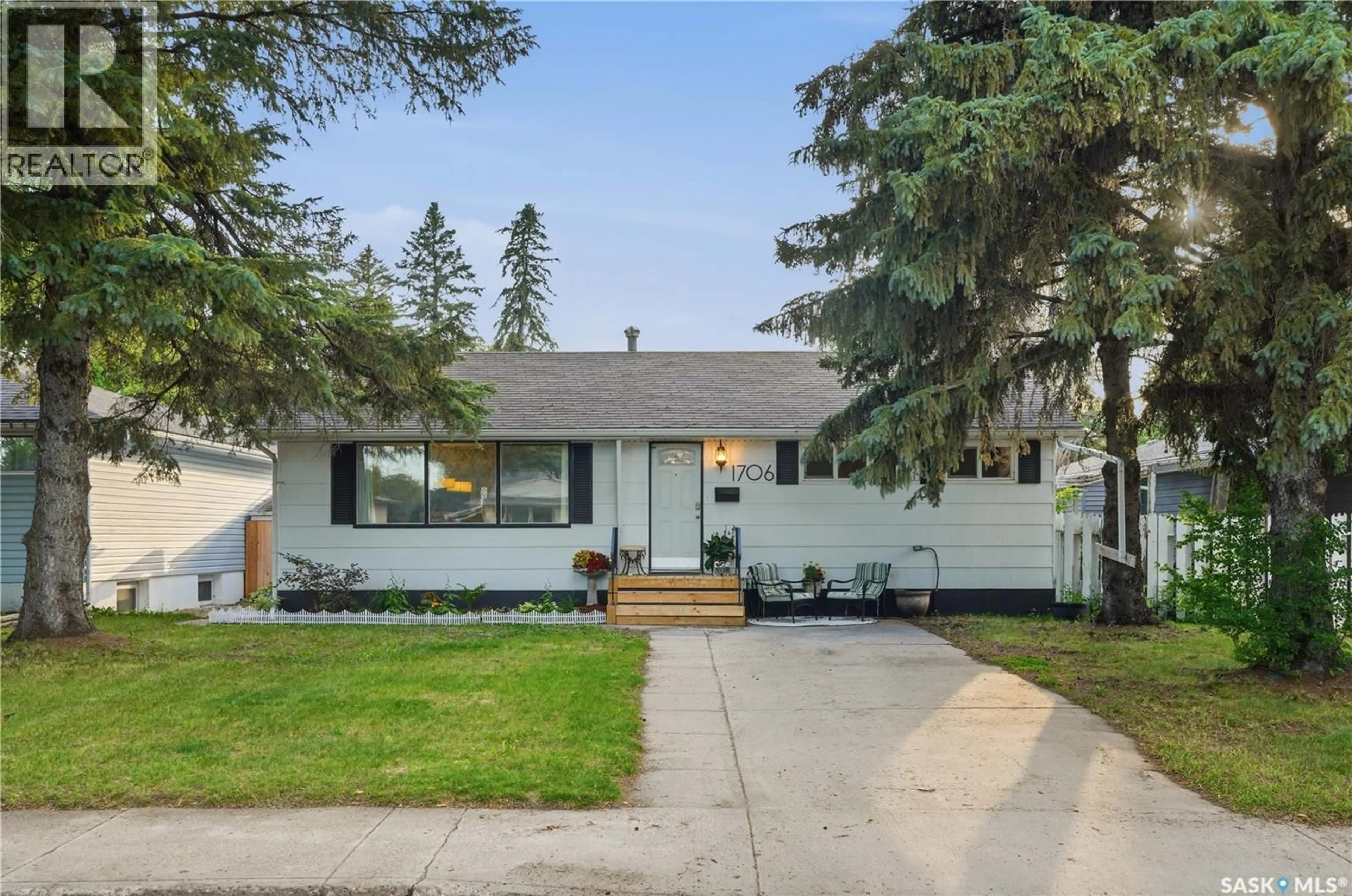Home with vinyl exterior material, street for 1706 EWART AVENUE, Saskatoon Saskatchewan S7H2L2
