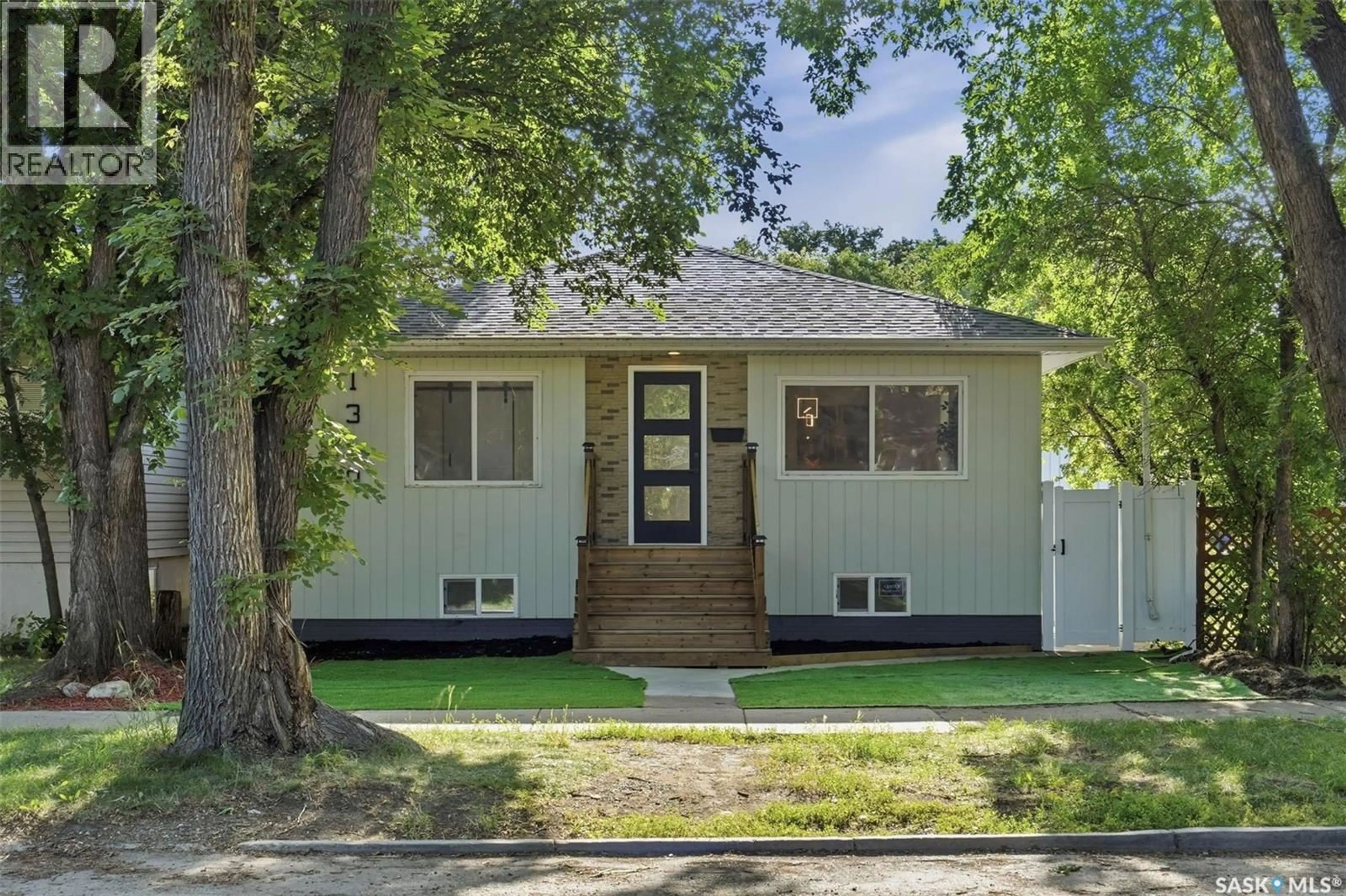 Home with vinyl exterior material, street for 1310 B AVENUE, Saskatoon Saskatchewan S7L1G5