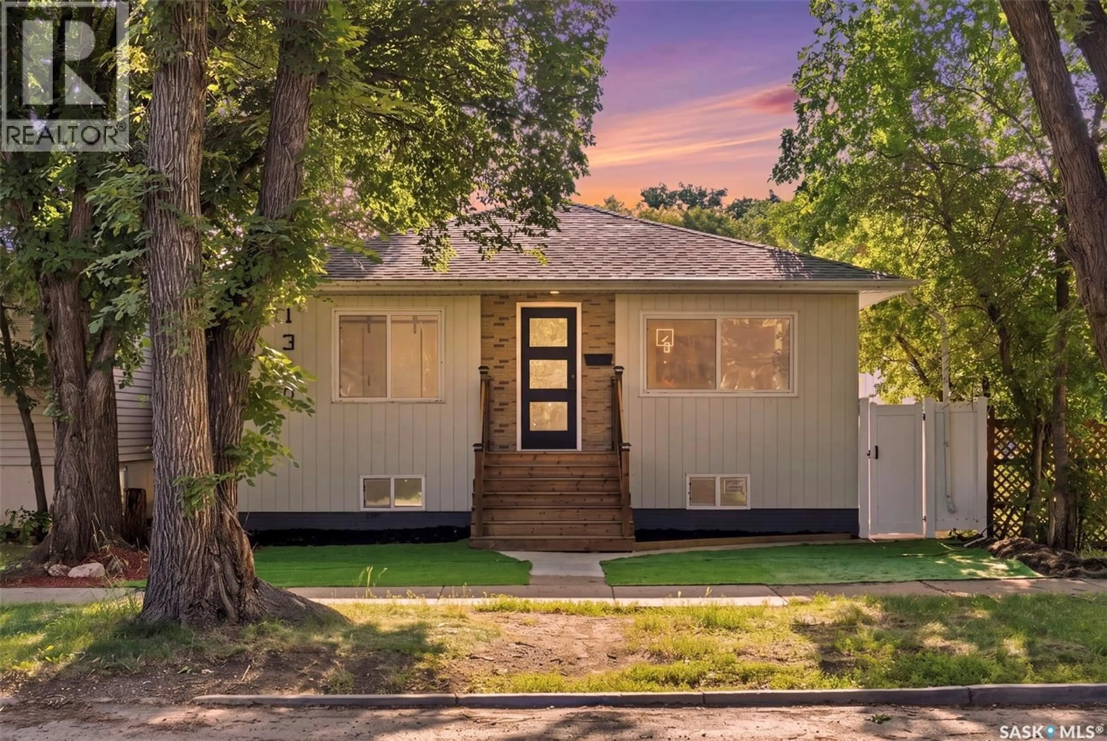 Home with vinyl exterior material, street for 1310 B AVENUE, Saskatoon Saskatchewan S7L1G5