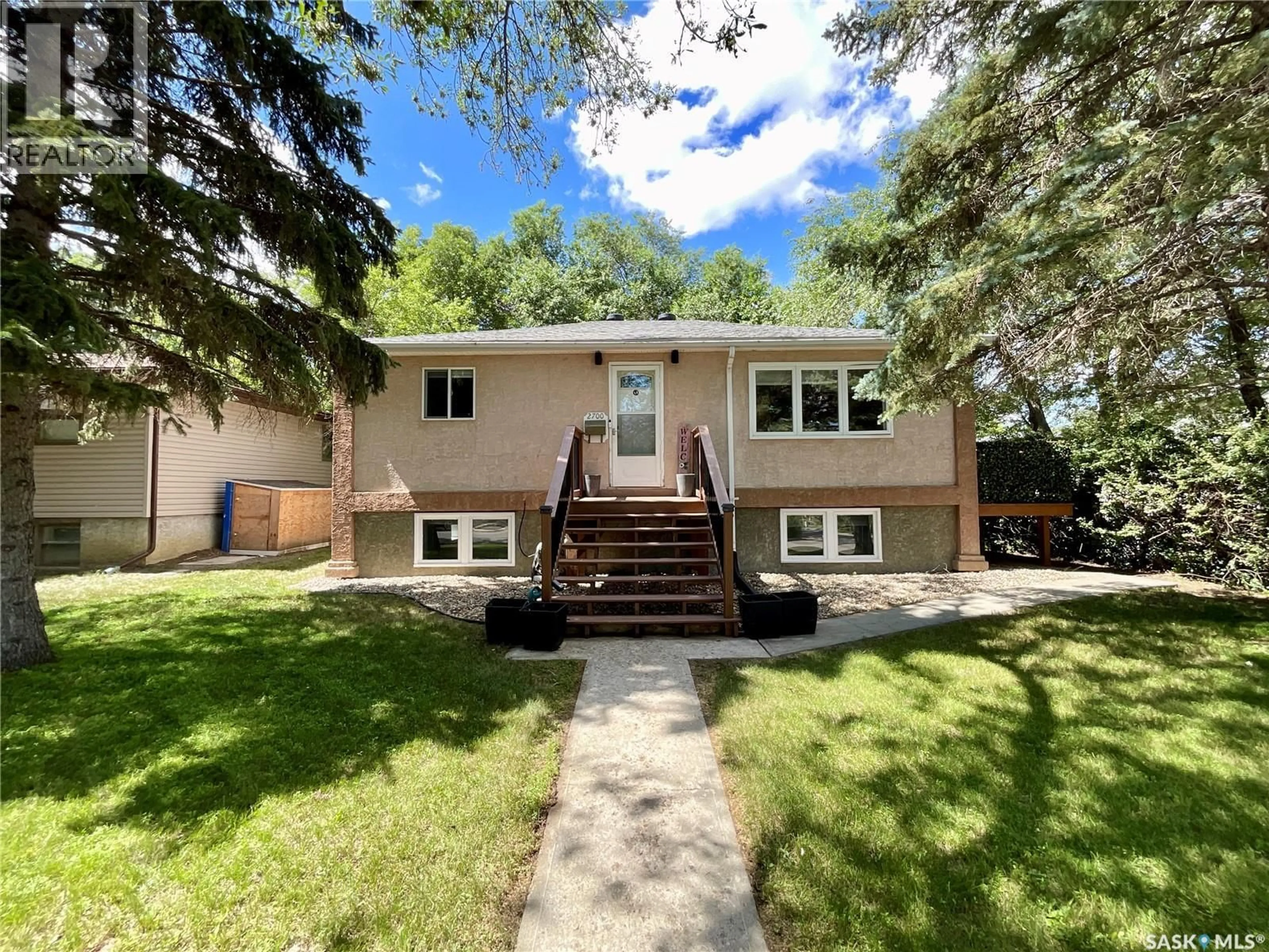 Home with vinyl exterior material, street for 2700 MCARA STREET, Regina Saskatchewan S4N2X1