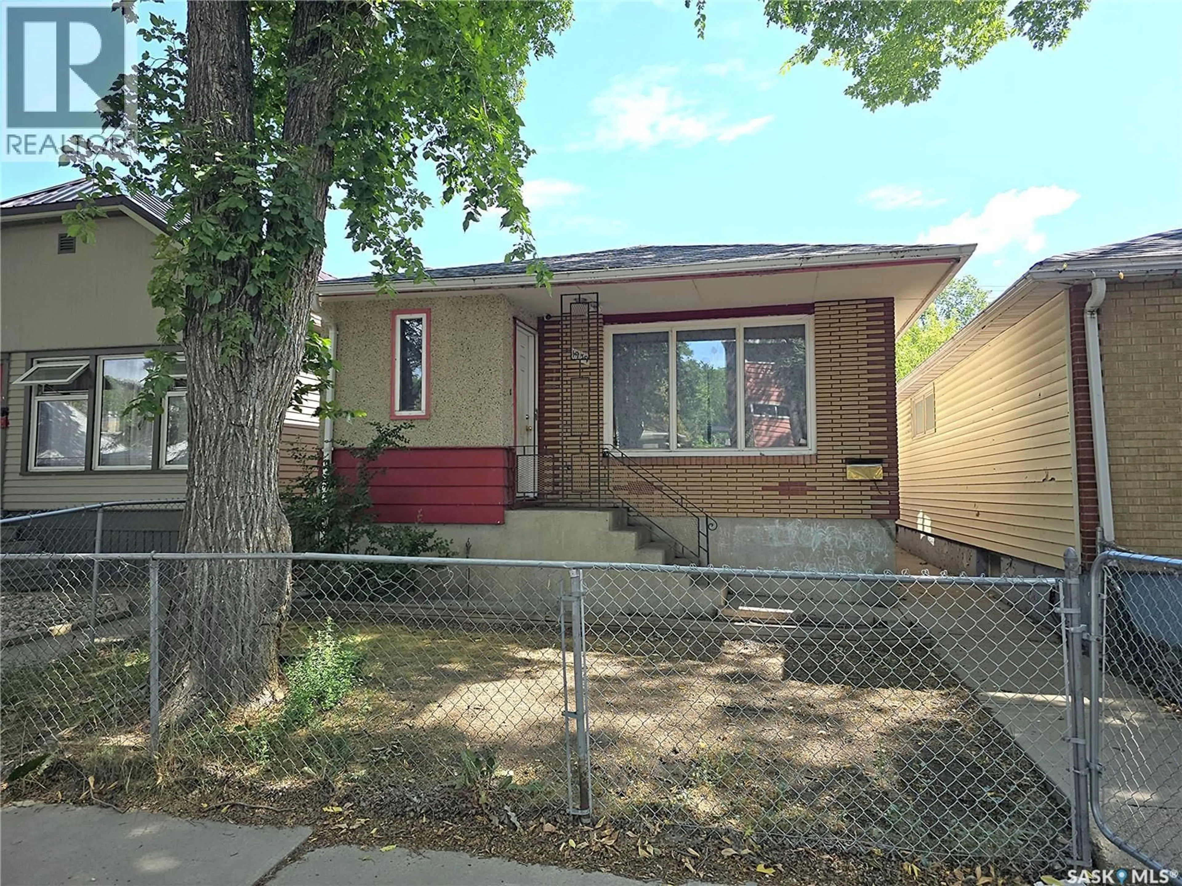Home with brick exterior material, street for 1939 QUEBEC STREET, Regina Saskatchewan S4P1J8