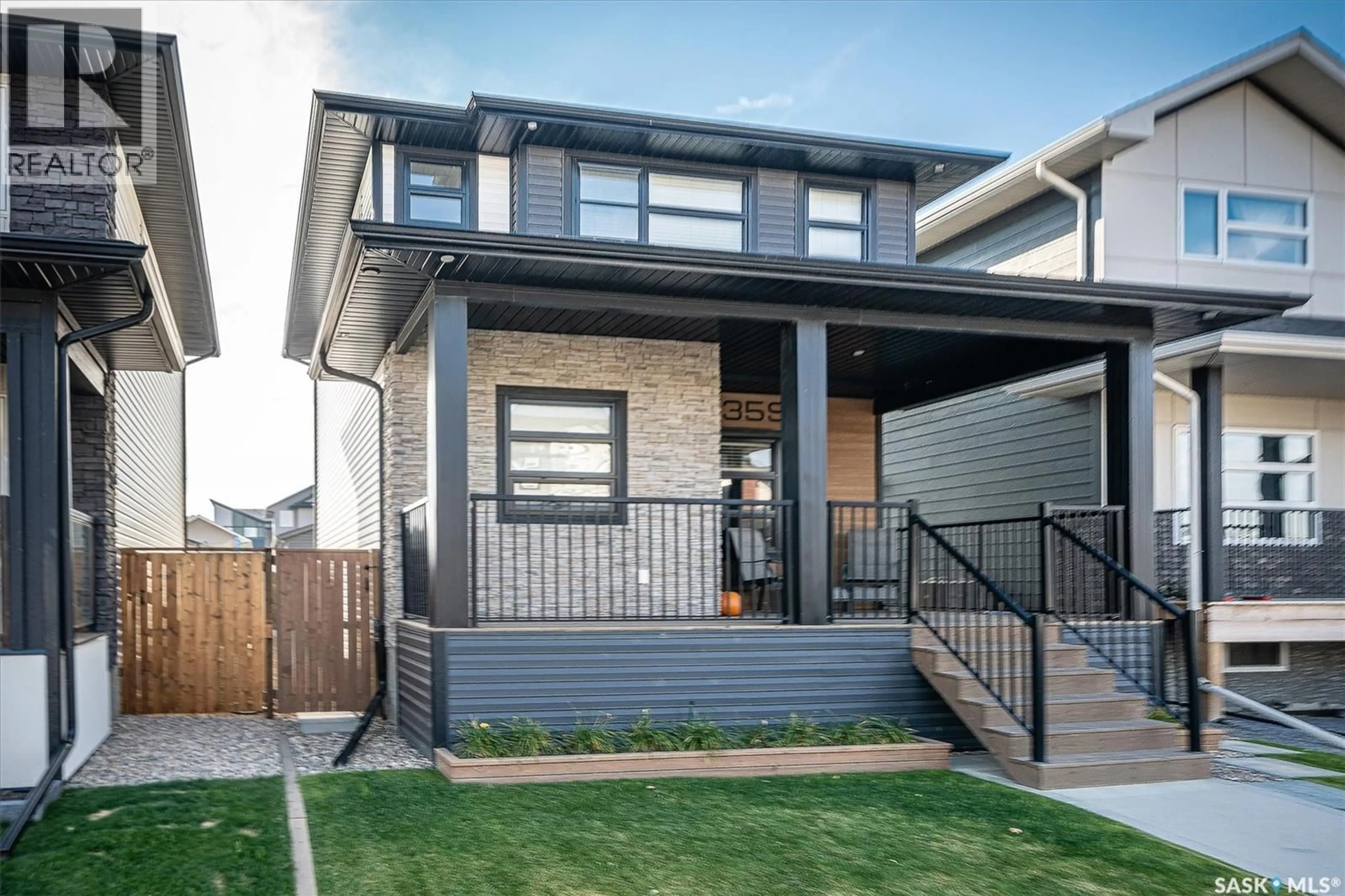 Home with brick exterior material, street for 359 MARLATTE STREET, Saskatoon Saskatchewan S7W0S7