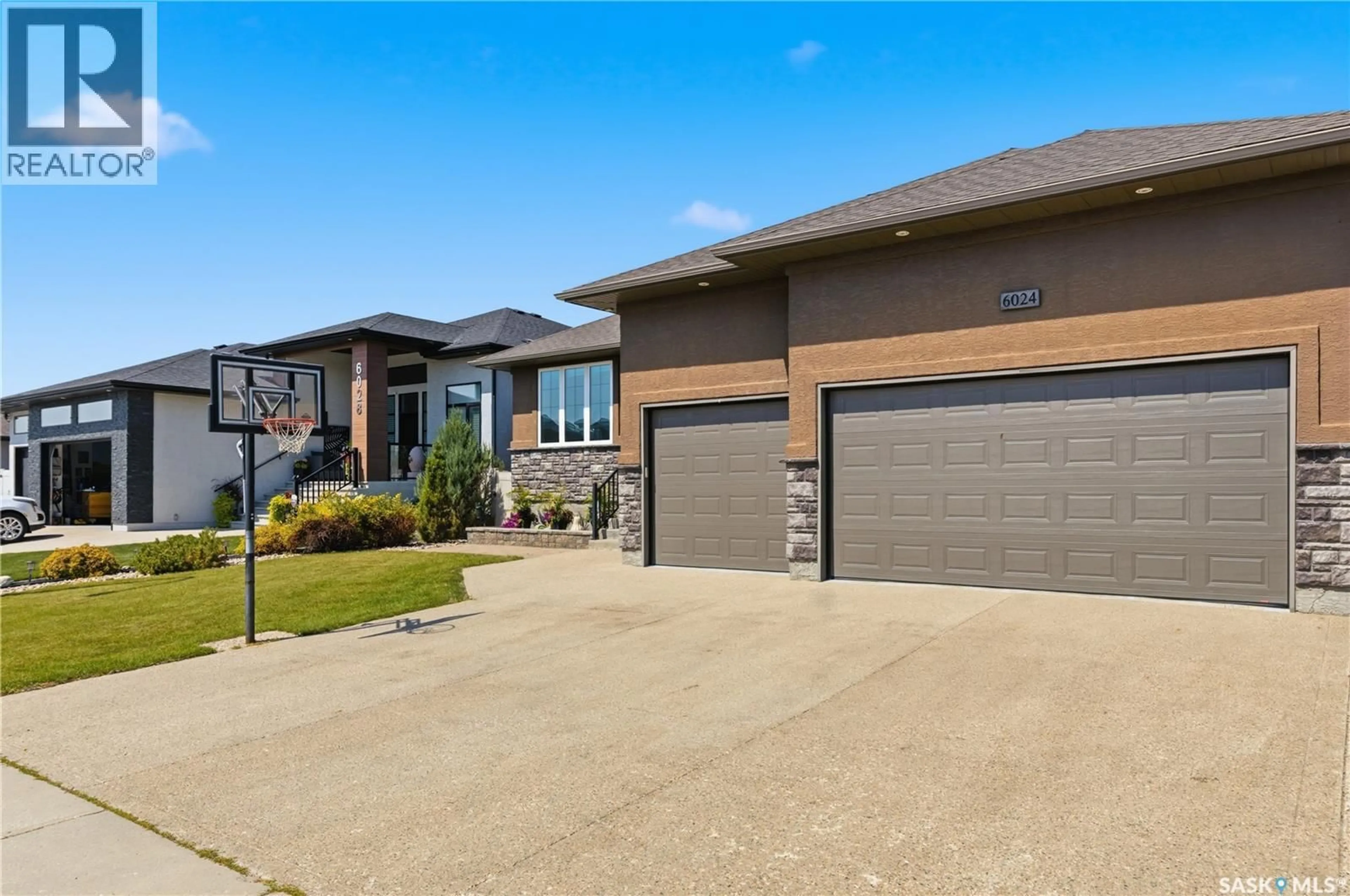 Home with brick exterior material, street for 6024 LITTLE PINE LOOP, Regina Saskatchewan S4X0H5