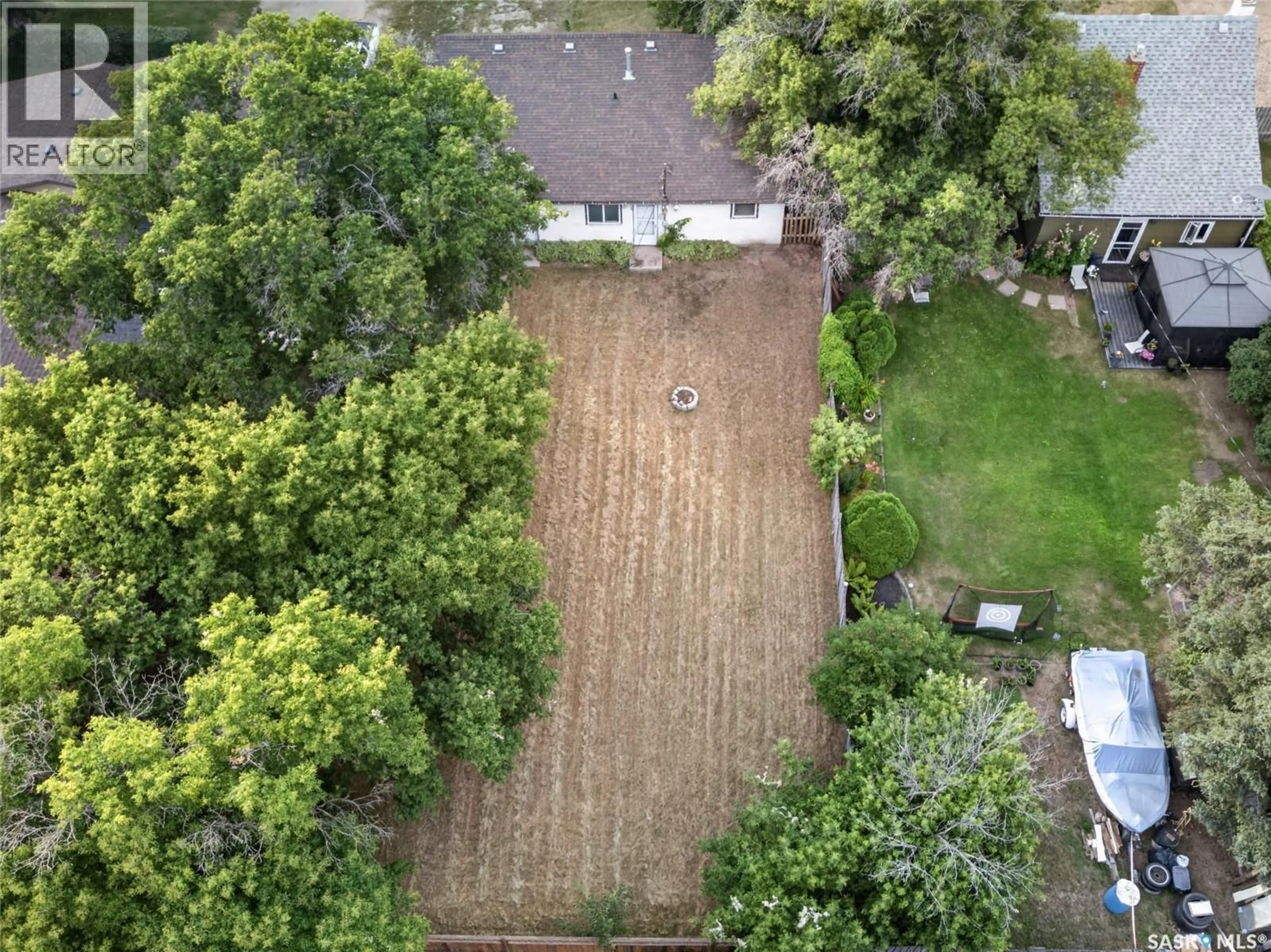 A pic from outside/outdoor area/front of a property/back of a property/a pic from drone, street for 108 1ST AVENUE, Vanscoy Saskatchewan S0L3J0