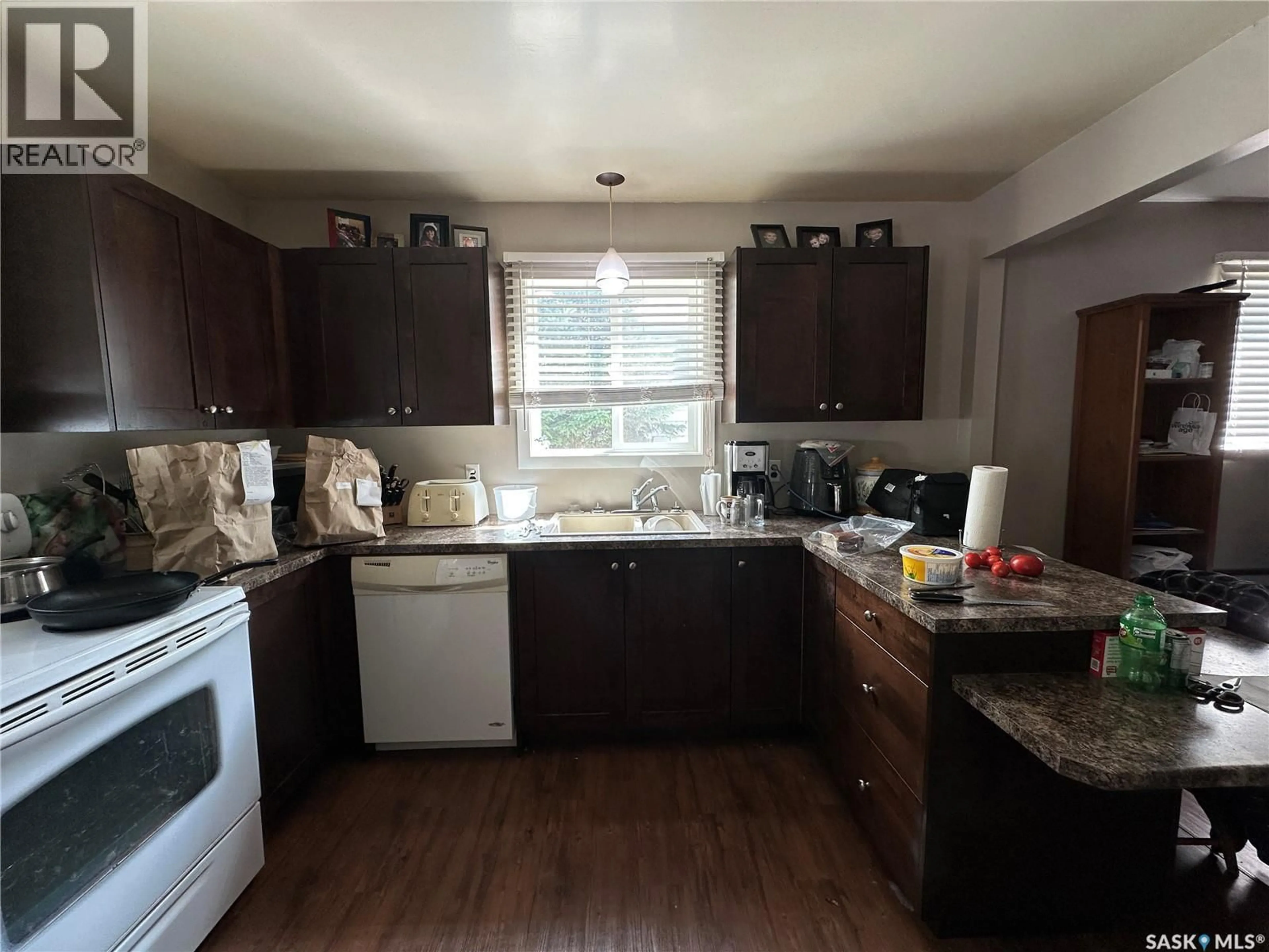 Standard kitchen, wood/laminate floor for 242 THIRD AVENUE, Kamsack Saskatchewan S0A1S0