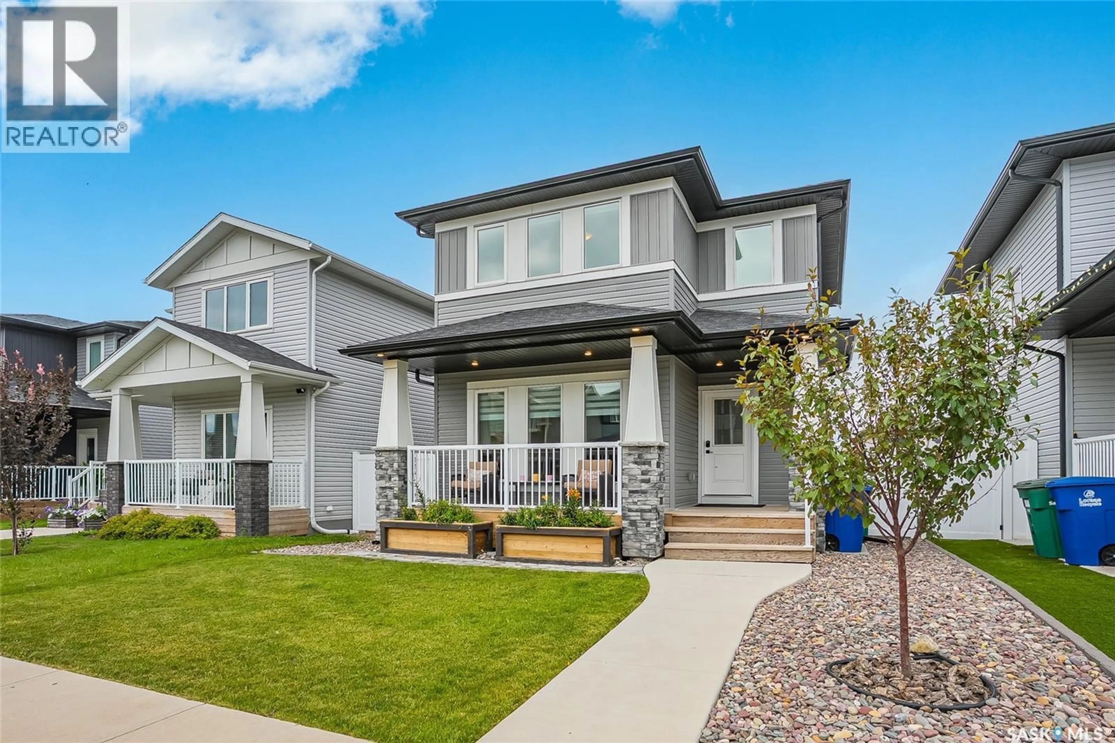 Home with vinyl exterior material, street for 222 DUBOIS CRESCENT, Saskatoon Saskatchewan S7V0R3