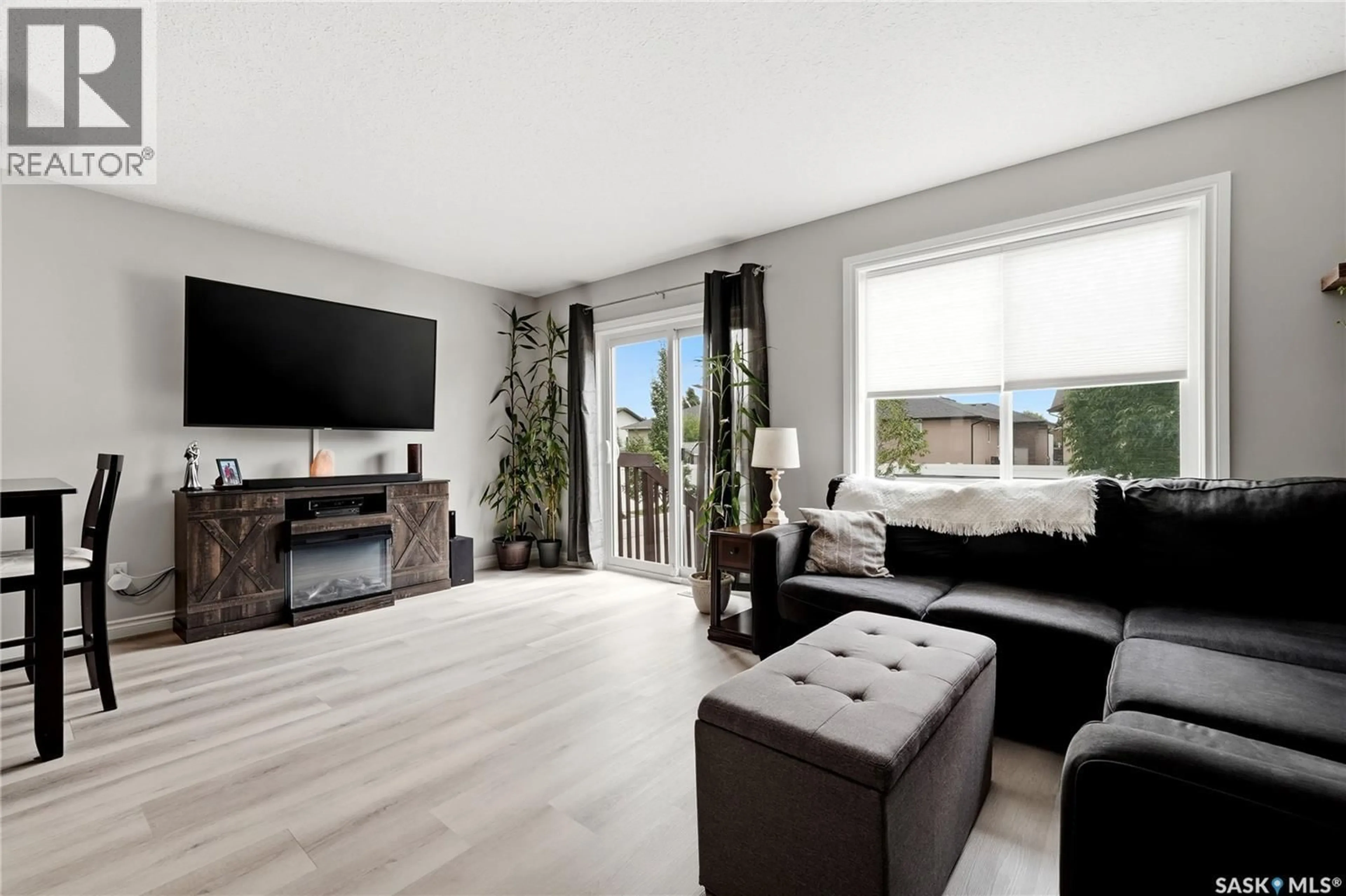 Living room with furniture, unknown for 105 PLAINS CIRCLE, Pilot Butte Saskatchewan S0G3Z0