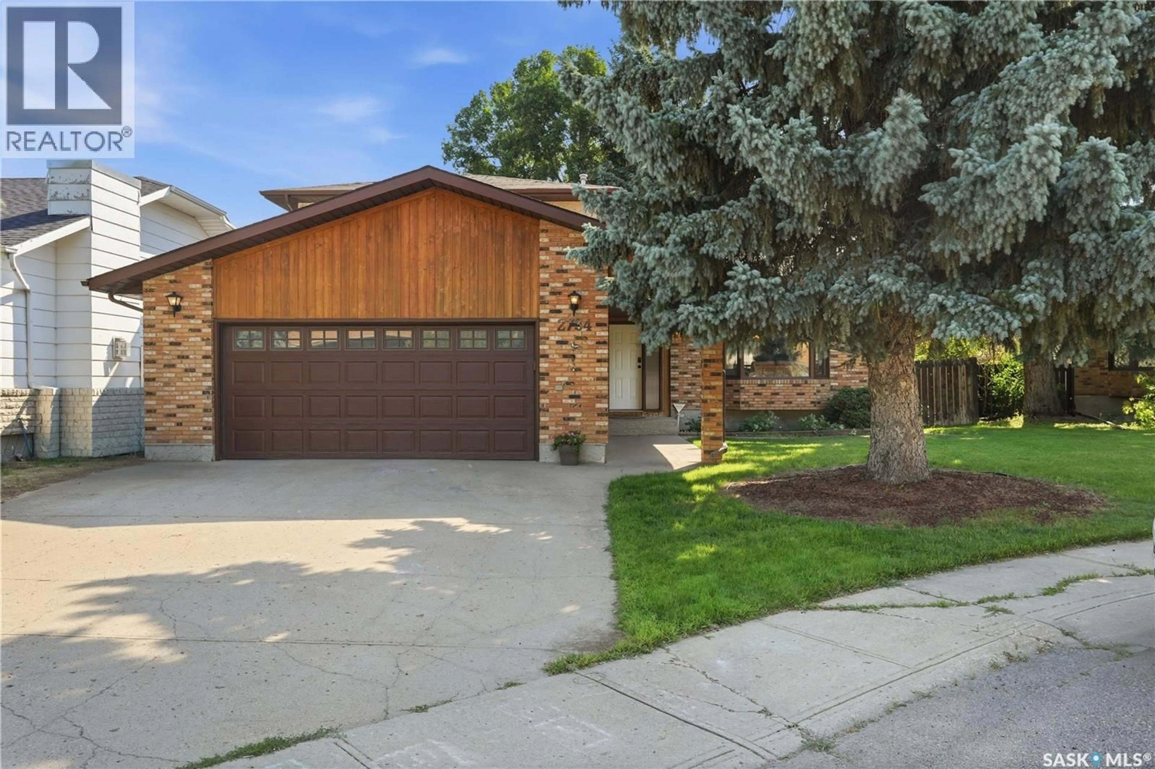 Home with brick exterior material, street for E - 2734 POPLAR PLACE, Regina Saskatchewan S4V1X8
