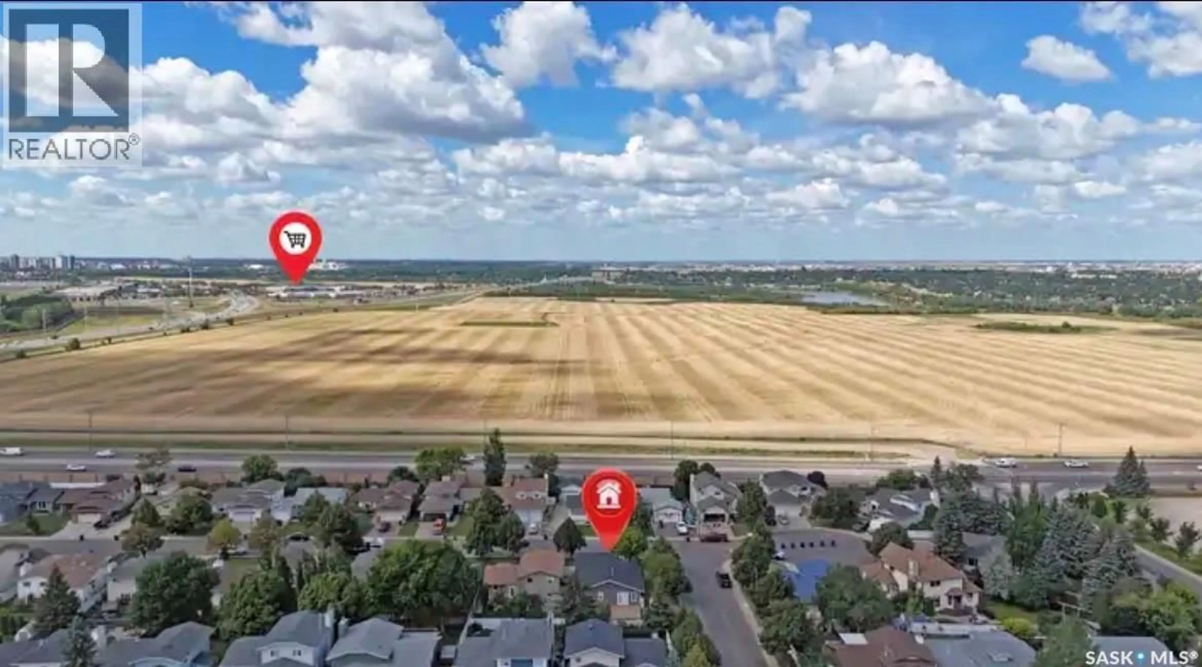 A pic from outside/outdoor area/front of a property/back of a property/a pic from drone, unknown for 303 HASLAM CRESCENT, Saskatoon Saskatchewan S7S1E4