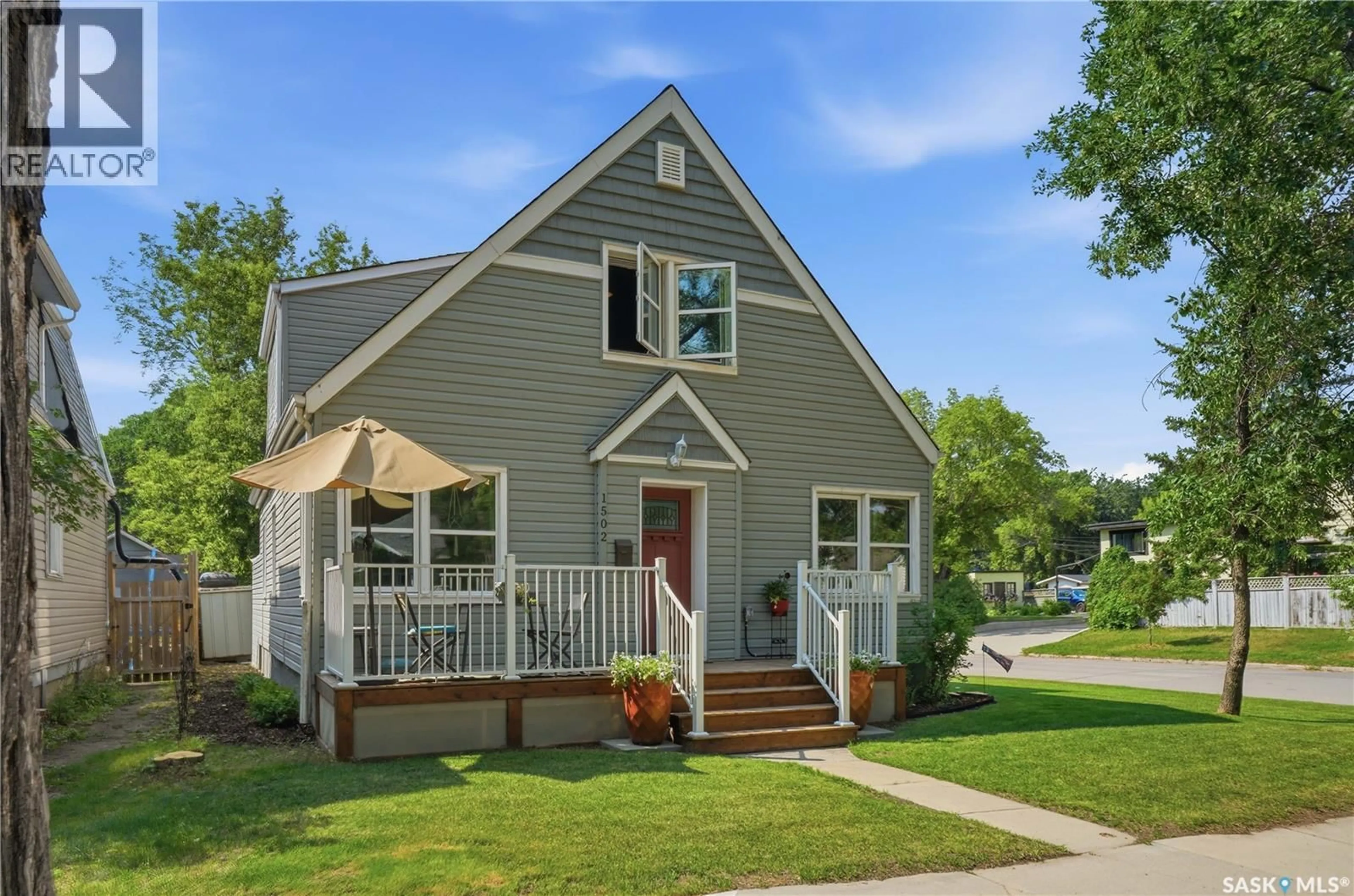 Home with vinyl exterior material, street for 1502 LORNE AVENUE, Saskatoon Saskatchewan S7H1Y1