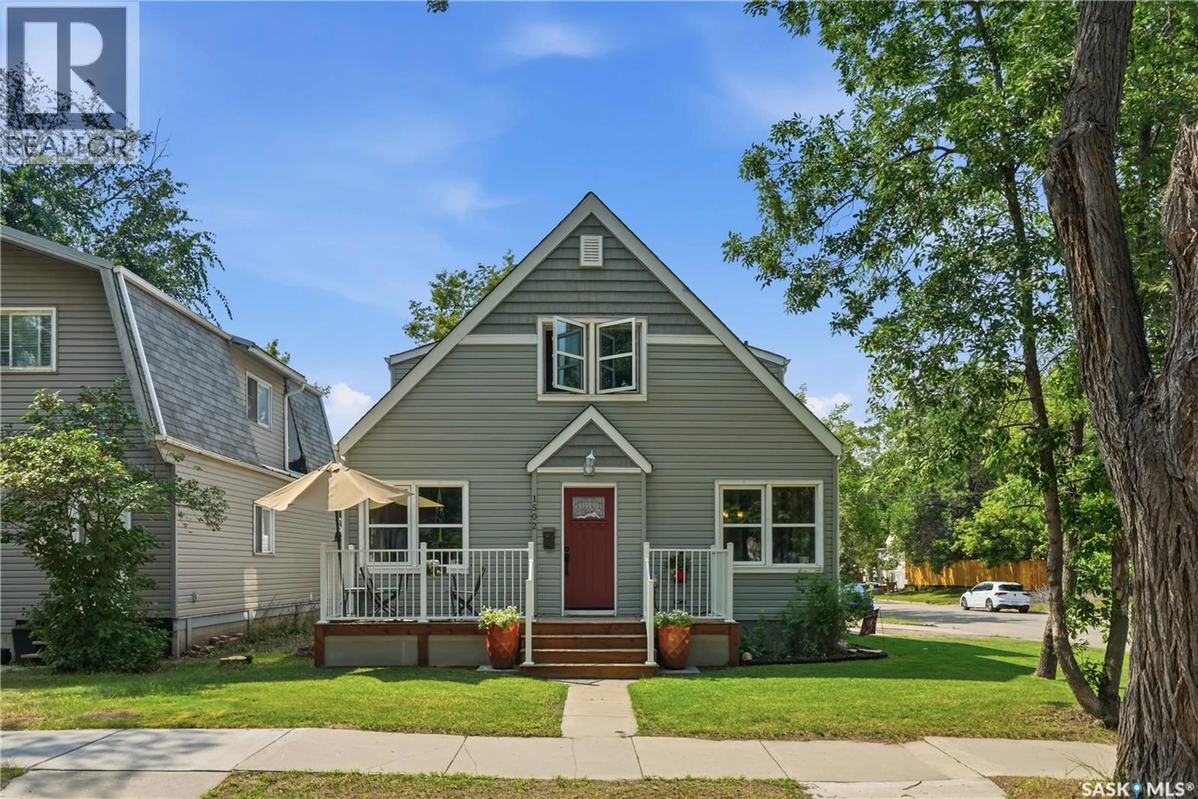 Home with vinyl exterior material, street for 1502 LORNE AVENUE, Saskatoon Saskatchewan S7H1Y1