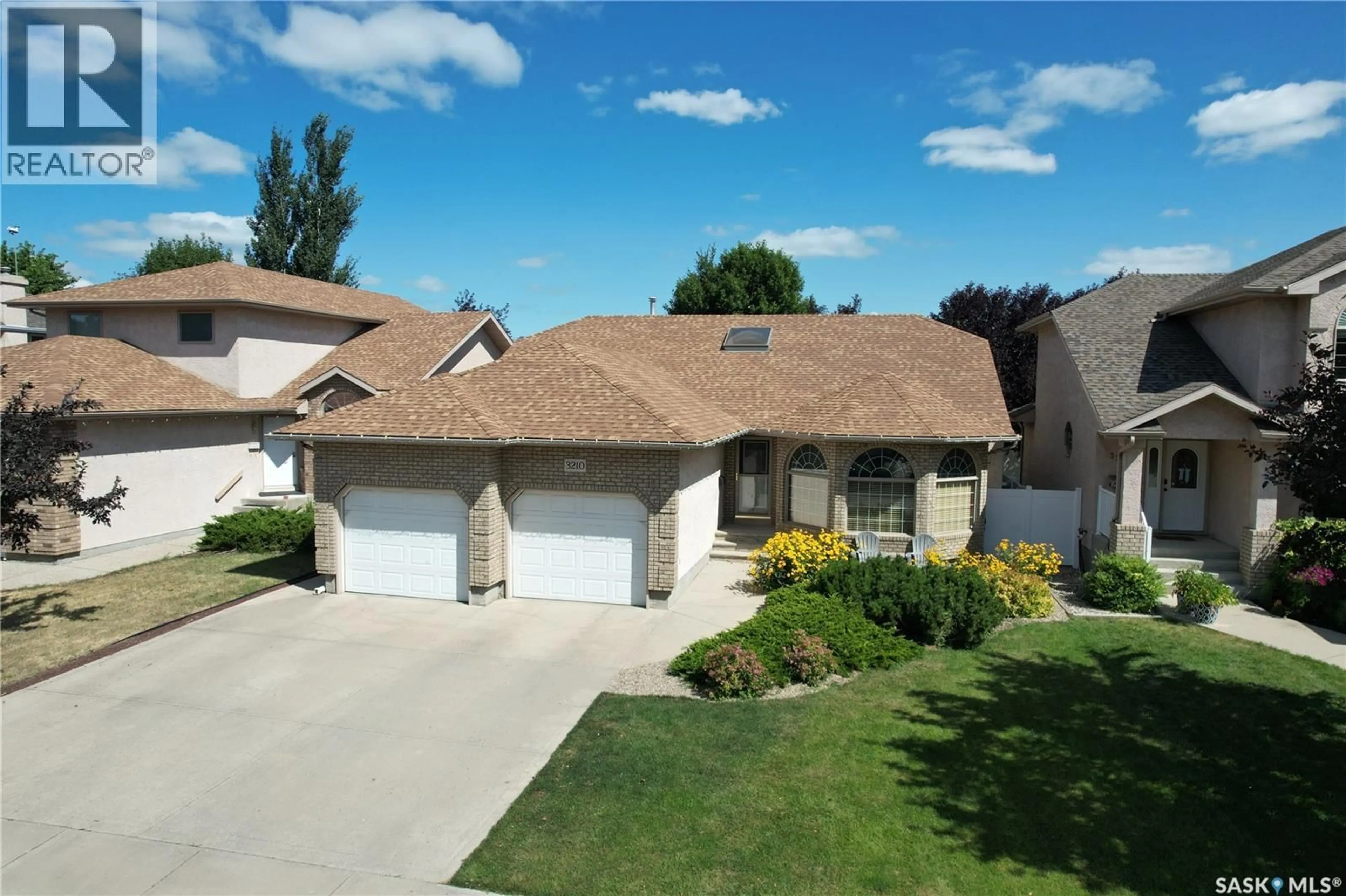 A pic from outside/outdoor area/front of a property/back of a property/a pic from drone, street for E - 3210 PEYSON BAY, Regina Saskatchewan S4V2W8