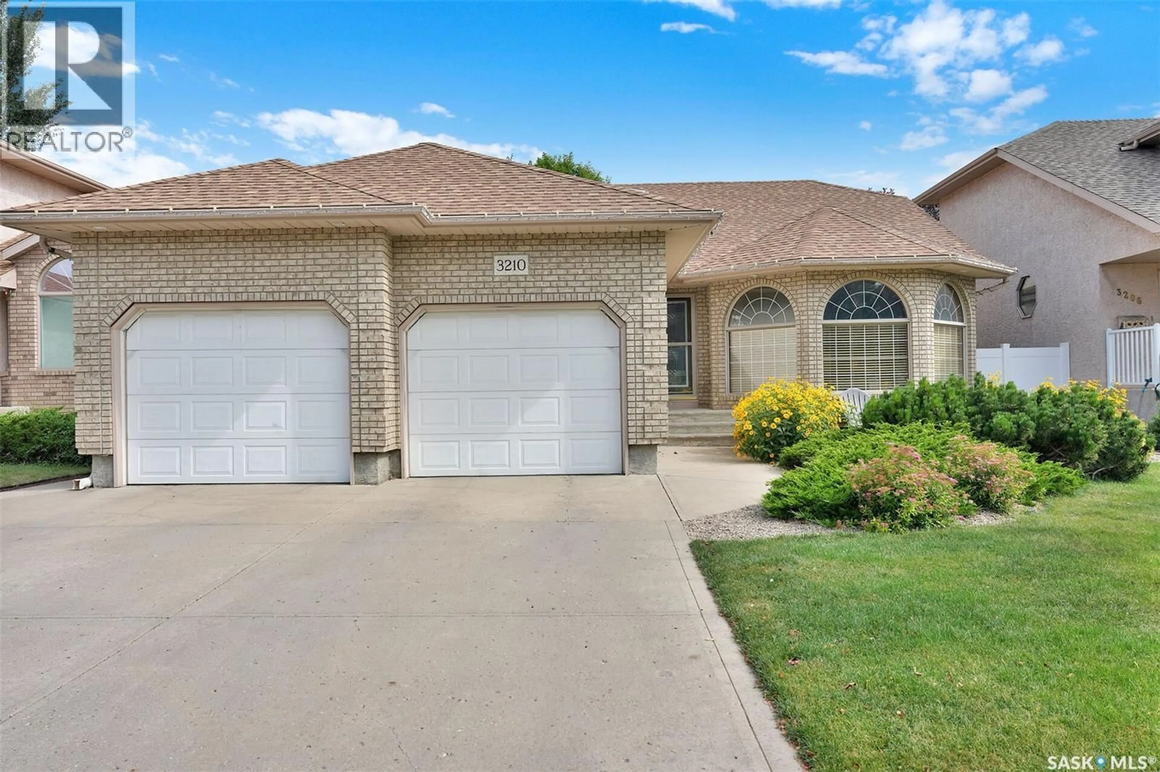 Home with brick exterior material, street for E - 3210 PEYSON BAY, Regina Saskatchewan S4V2W8