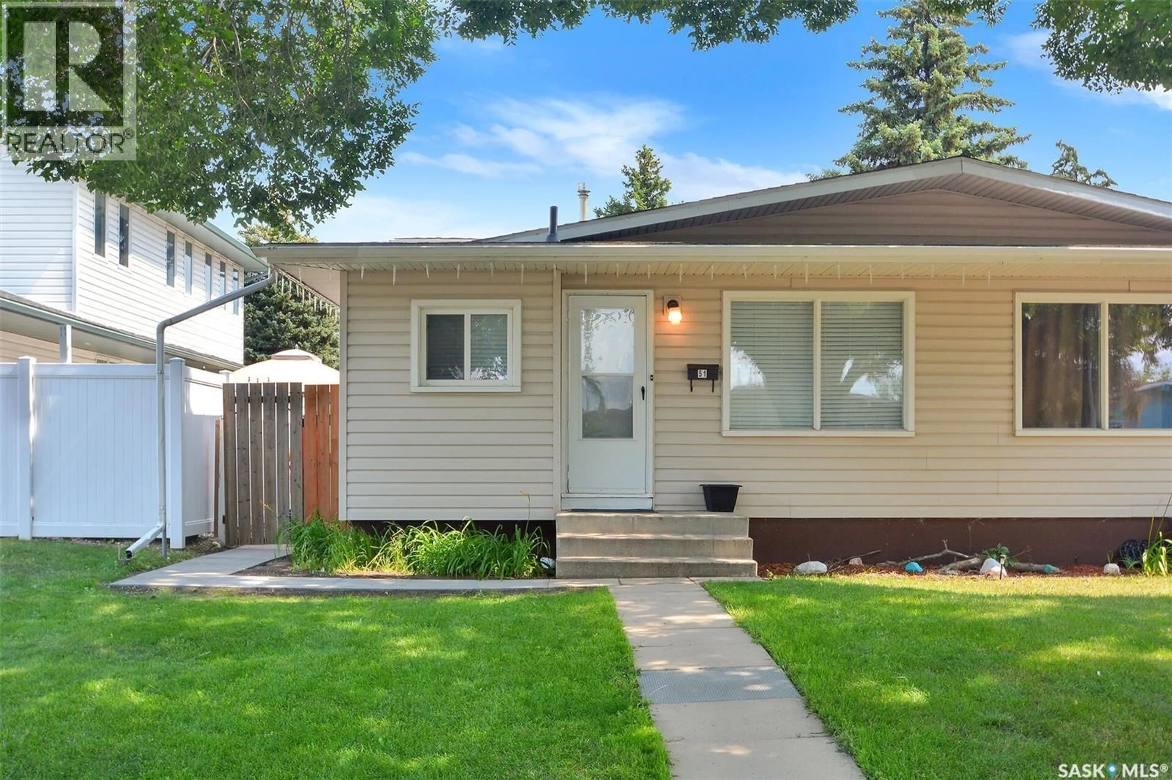 Home with vinyl exterior material, street for 49-51 CARLETON DRIVE, Saskatoon Saskatchewan S7H3N9