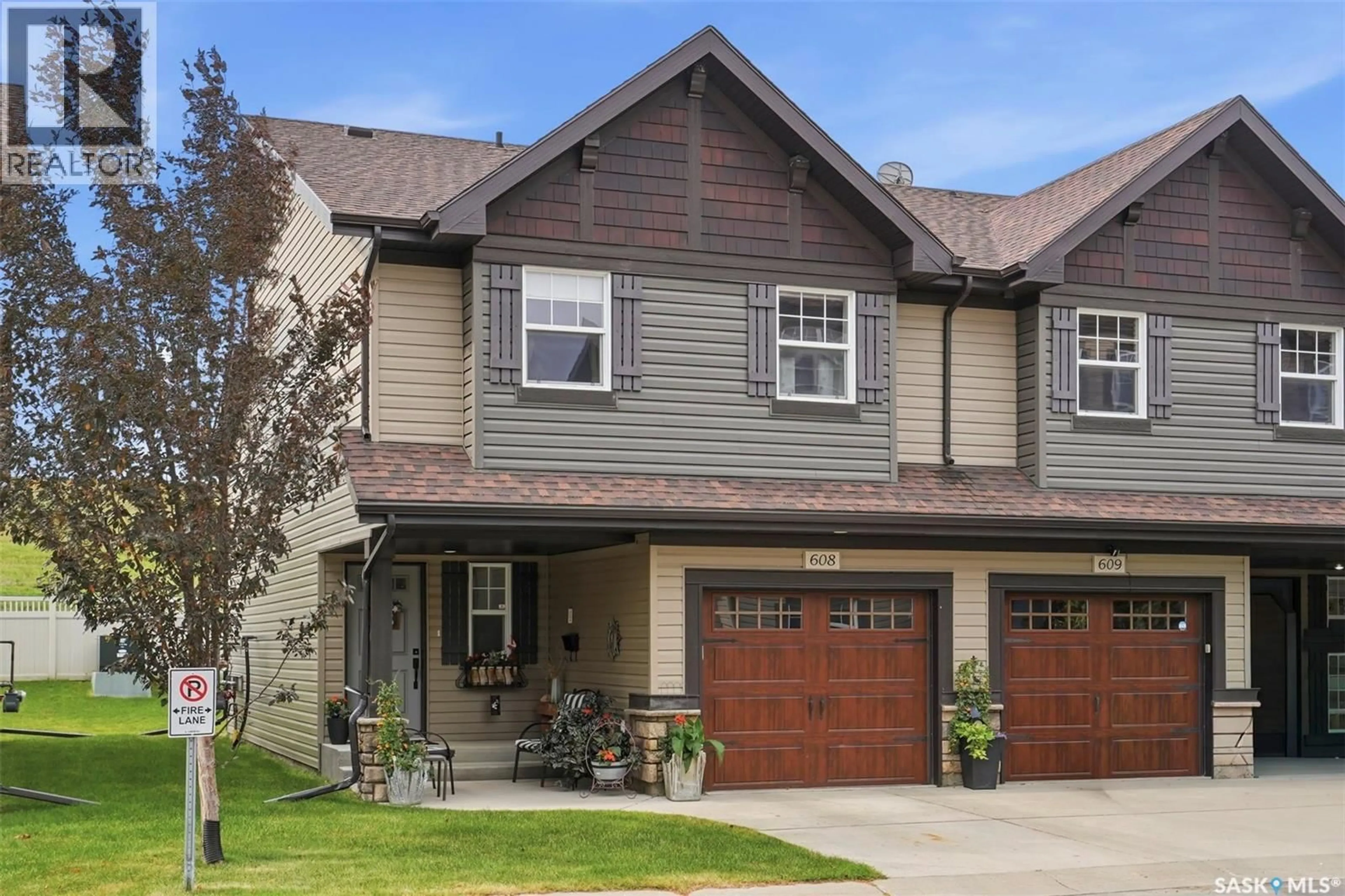 Home with vinyl exterior material, street for 150 - 608 LANGLOIS WAY, Saskatoon Saskatchewan S7T1C8