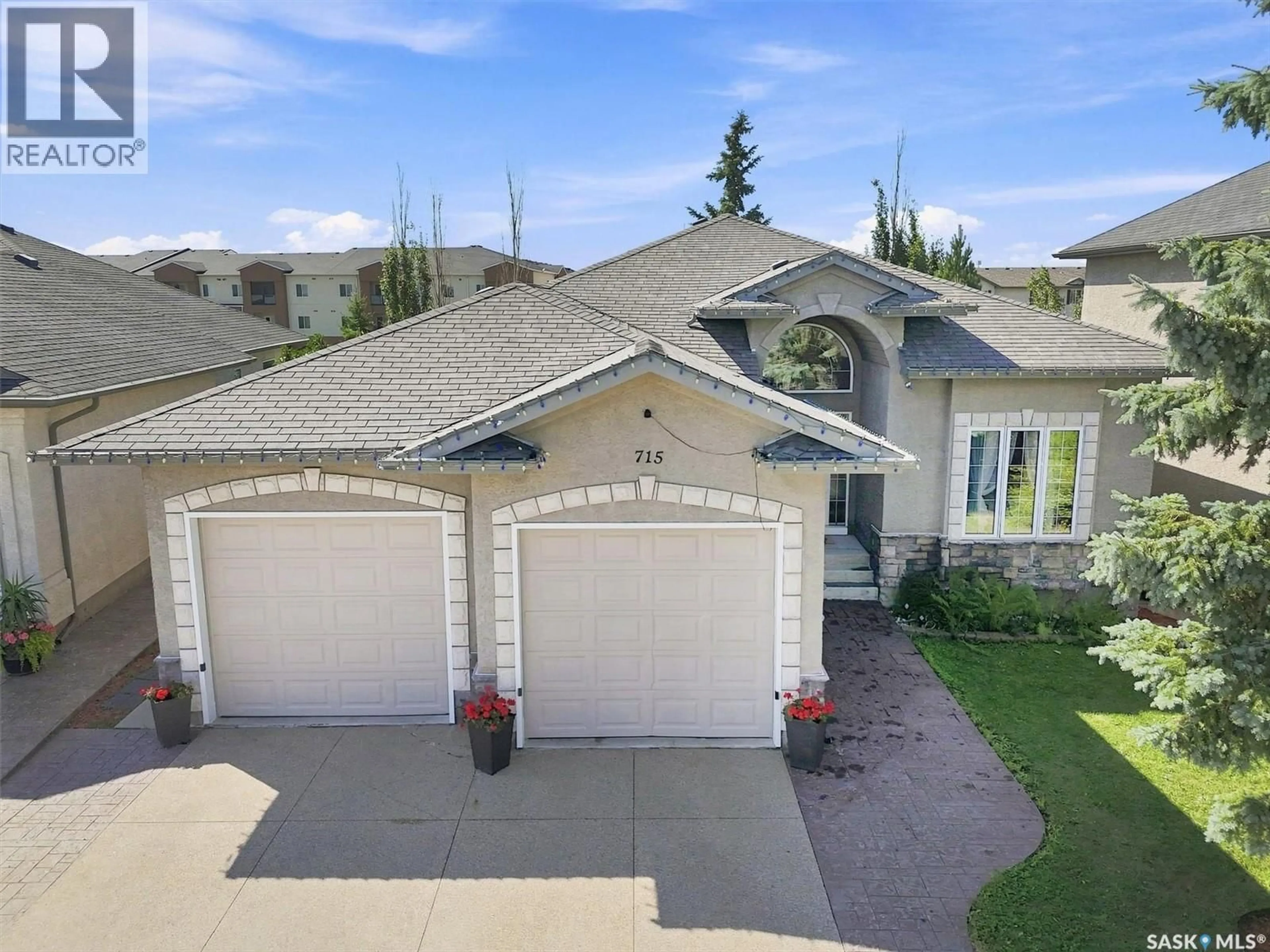 A pic from outside/outdoor area/front of a property/back of a property/a pic from drone, street for 715 BELLMONT COURT, Saskatoon Saskatchewan S7V1K7