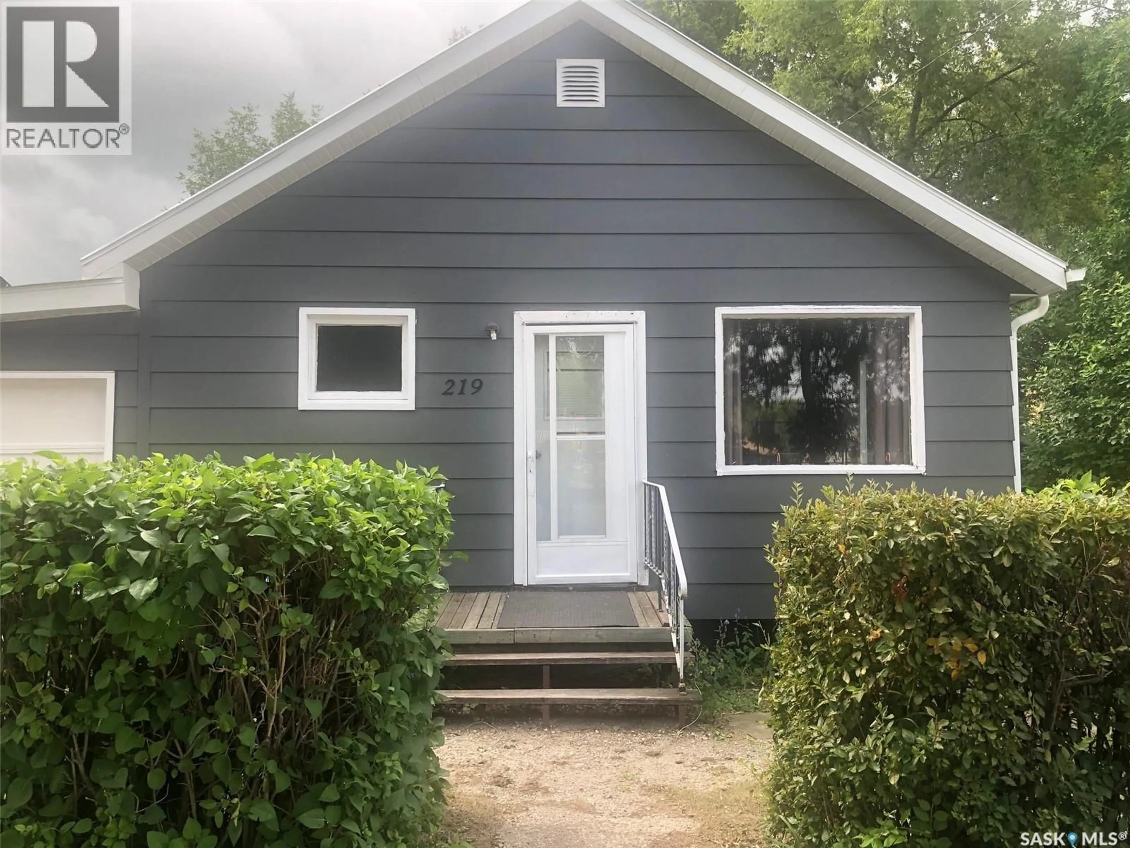 Home with vinyl exterior material, street for 219 3RD AVENUE, Canora Saskatchewan S0A0L0
