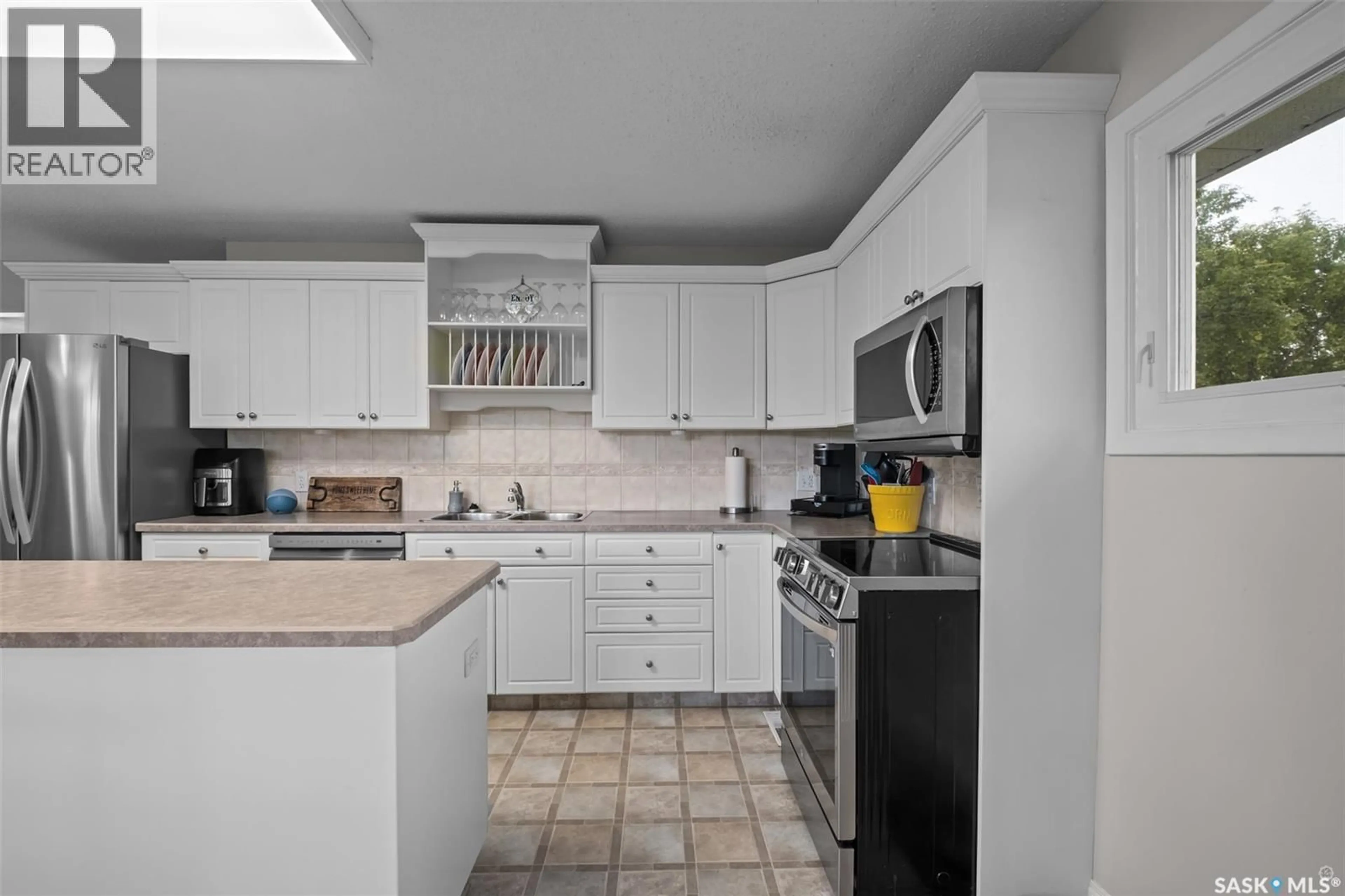 Standard kitchen, ceramic/tile floor for 225 1ST STREET, Beatty Saskatchewan S0J0C0