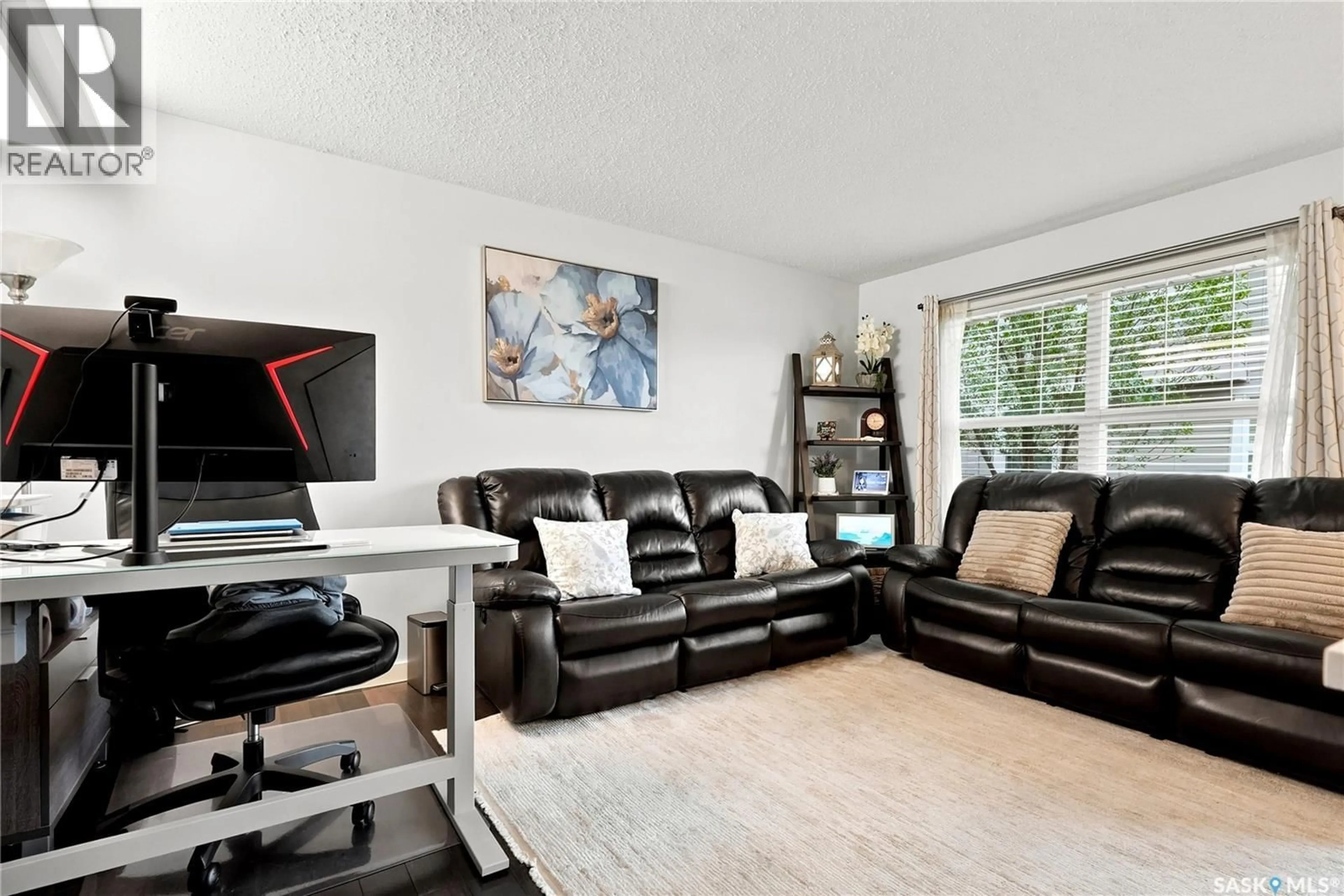 Living room with furniture, unknown for 102 - 410 LEDINGHAM WAY, Saskatoon Saskatchewan S7V0C4