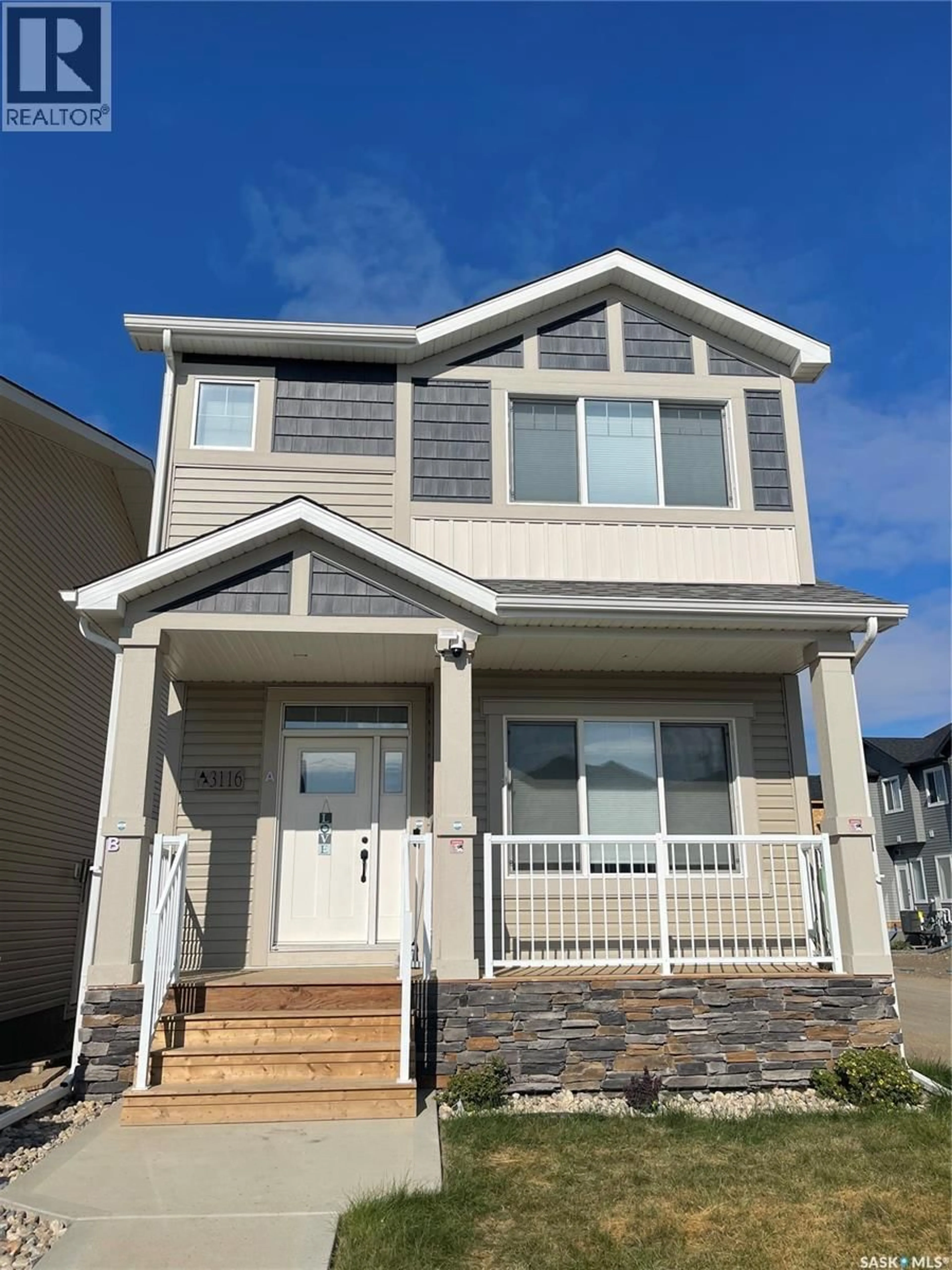 Home with vinyl exterior material, street for 3116 GREEN TURTLE ROAD, Regina Saskatchewan S4N7K9