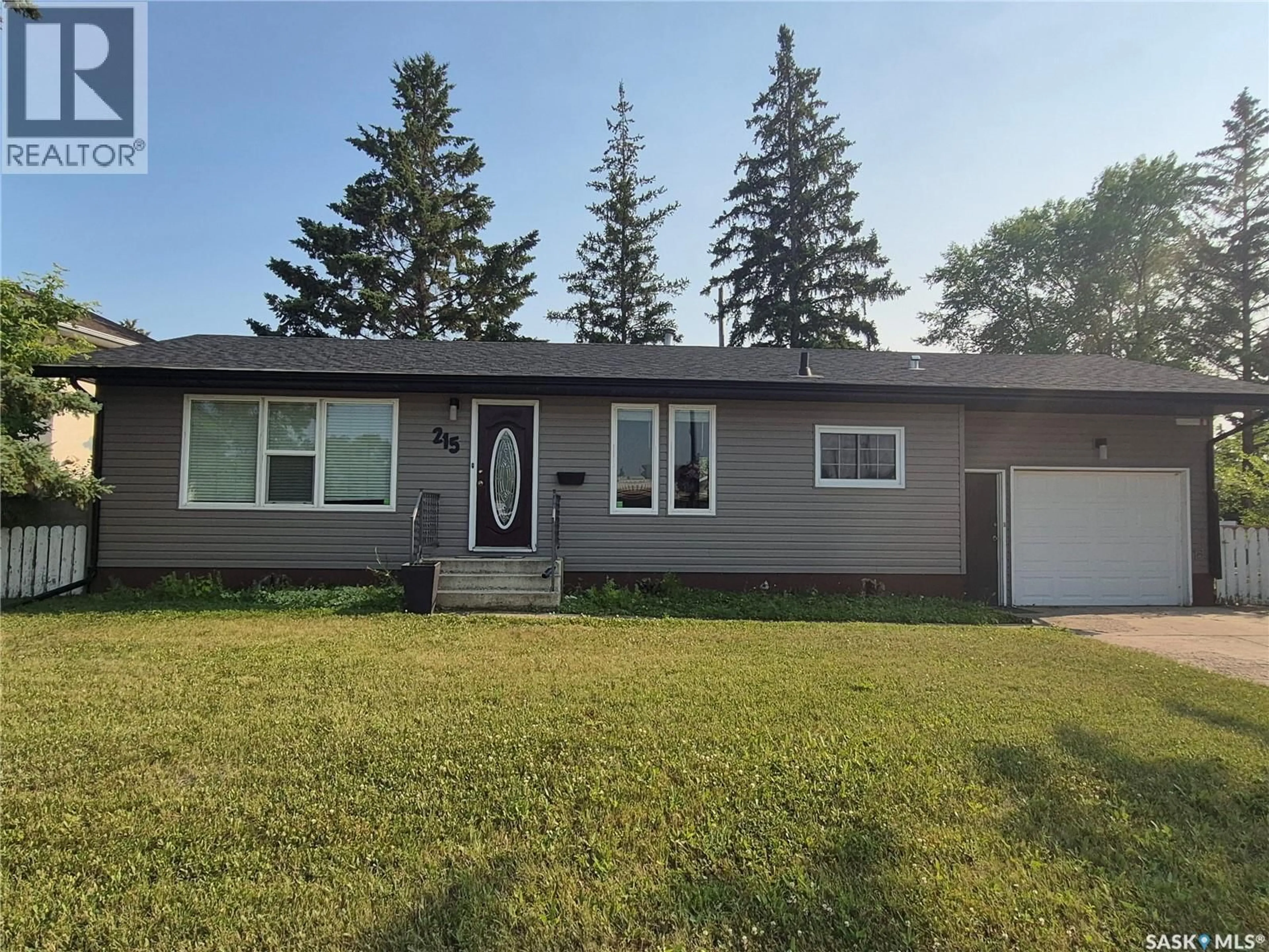 Home with vinyl exterior material, street for 215 CENTRAL STREET, Warman Saskatchewan S0K4S0