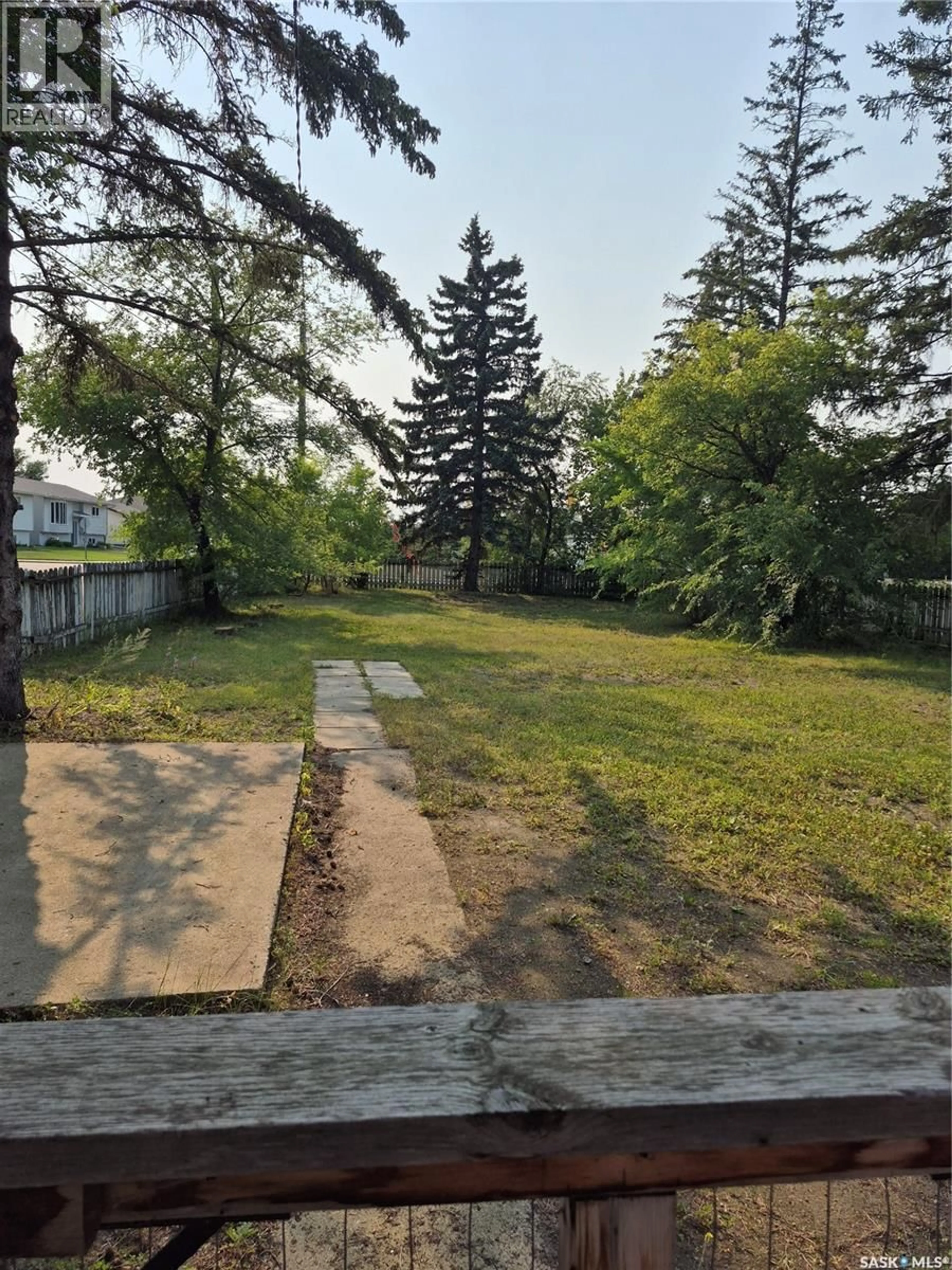 A pic from outside/outdoor area/front of a property/back of a property/a pic from drone, forest/trees view for 215 CENTRAL STREET, Warman Saskatchewan S0K4S0