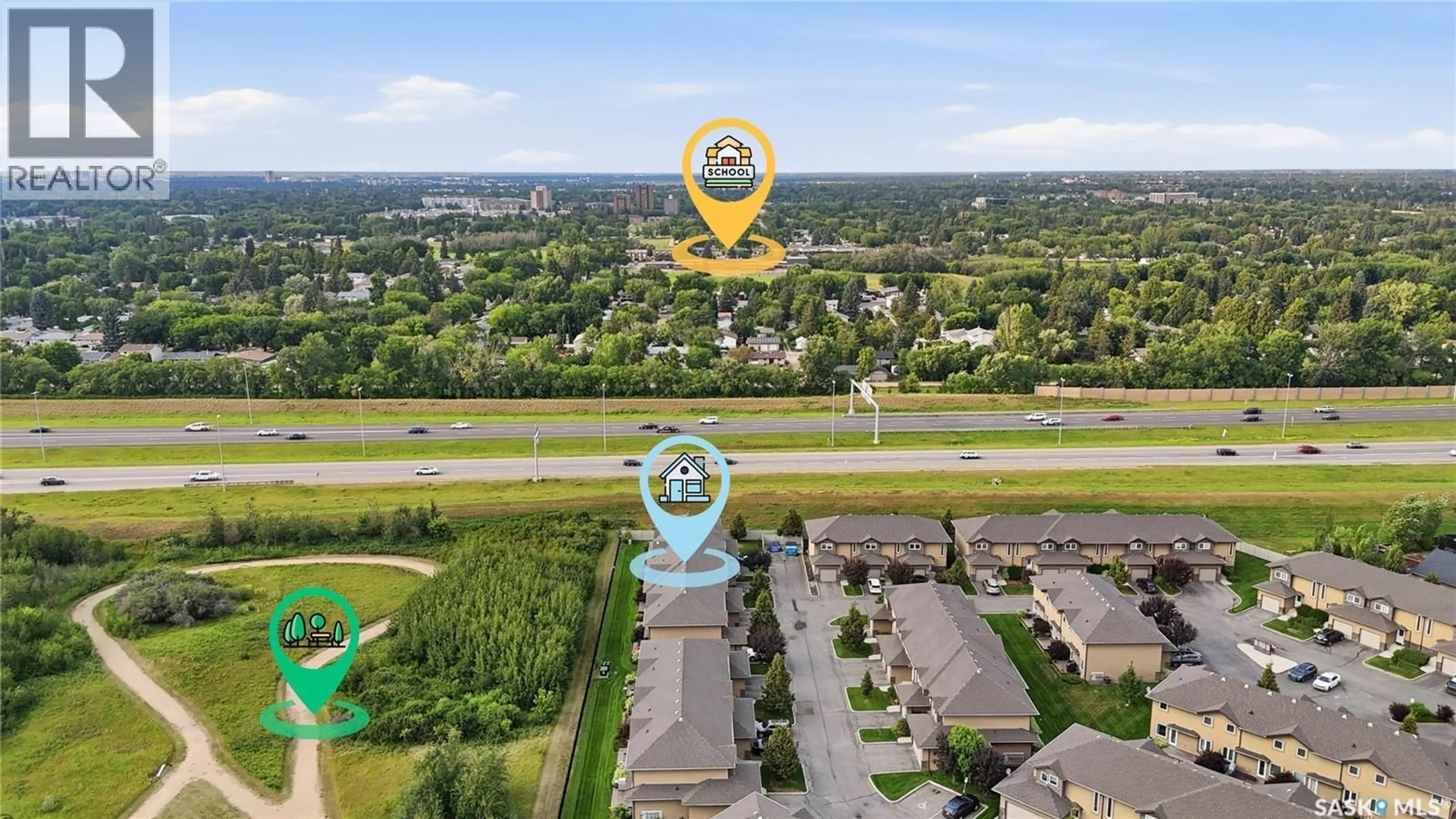 A pic from outside/outdoor area/front of a property/back of a property/a pic from drone, water/lake/river/ocean view for 502 - 14 REMPEL MANOR, Saskatoon Saskatchewan S7T0L7