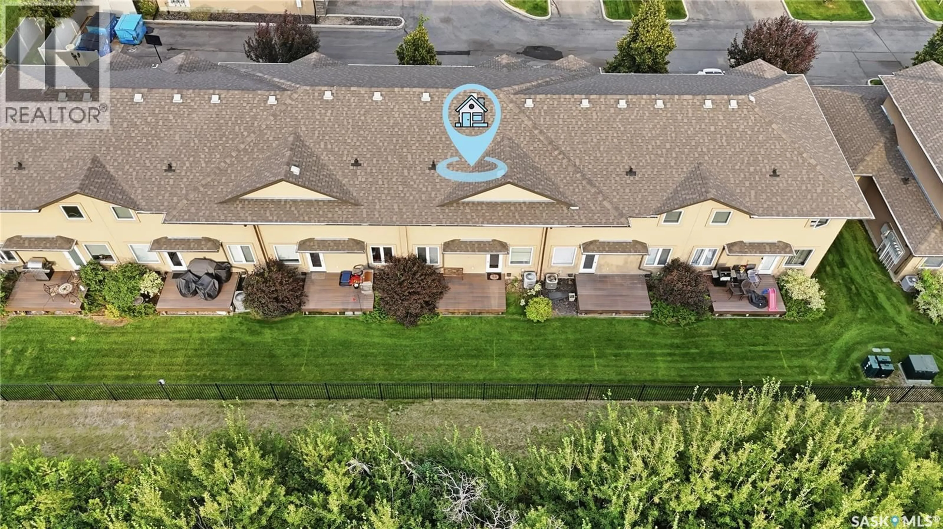A pic from outside/outdoor area/front of a property/back of a property/a pic from drone, unknown for 502 - 14 REMPEL MANOR, Saskatoon Saskatchewan S7T0L7