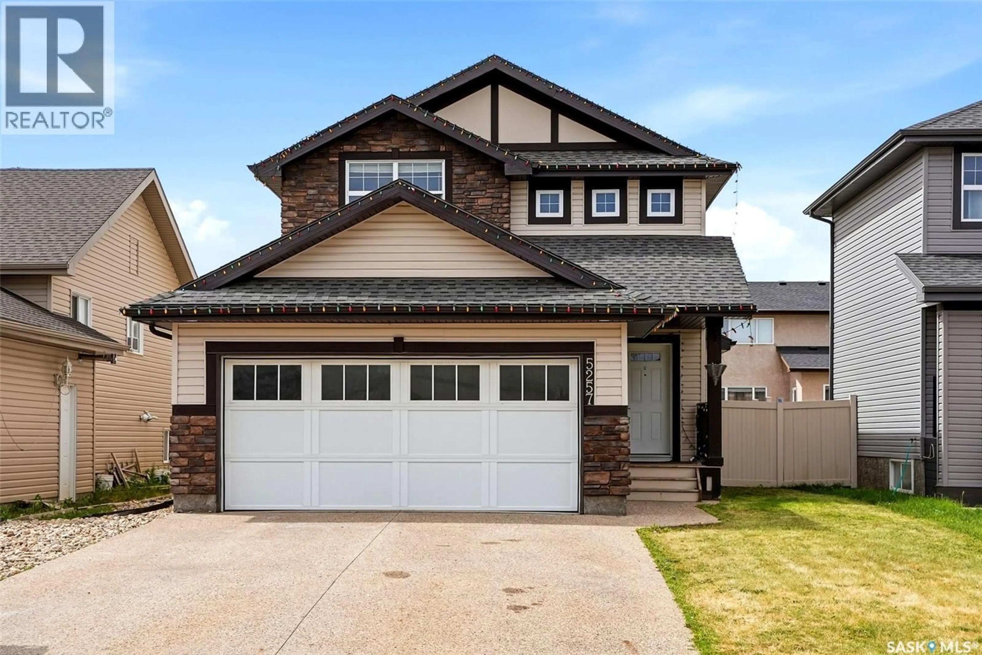 Home with vinyl exterior material, street for 5257 CANUCK CRESCENT, Regina Saskatchewan S4W0H2