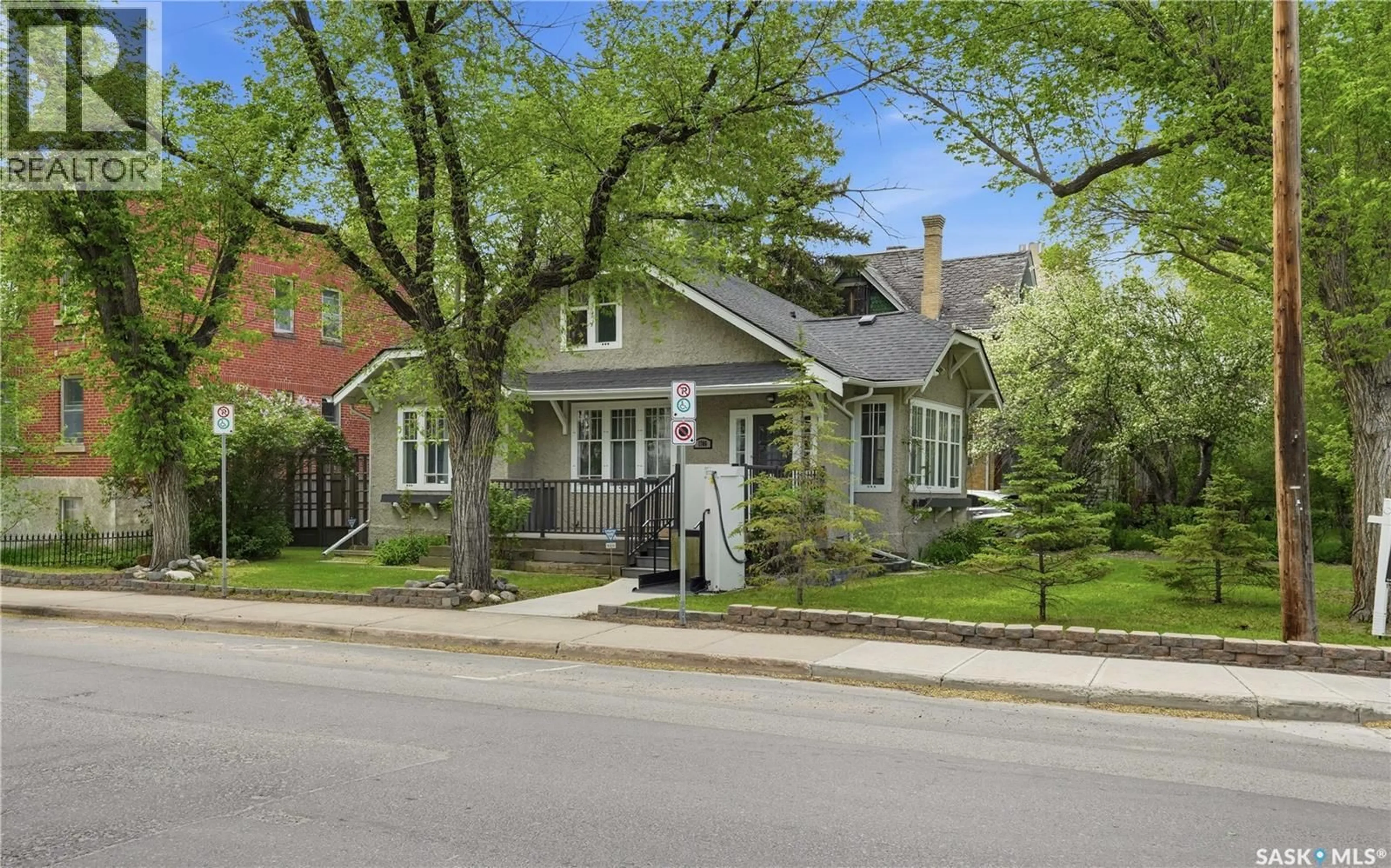 Home with brick exterior material, street for 1706 15TH AVENUE, Regina Saskatchewan S4P0Z7