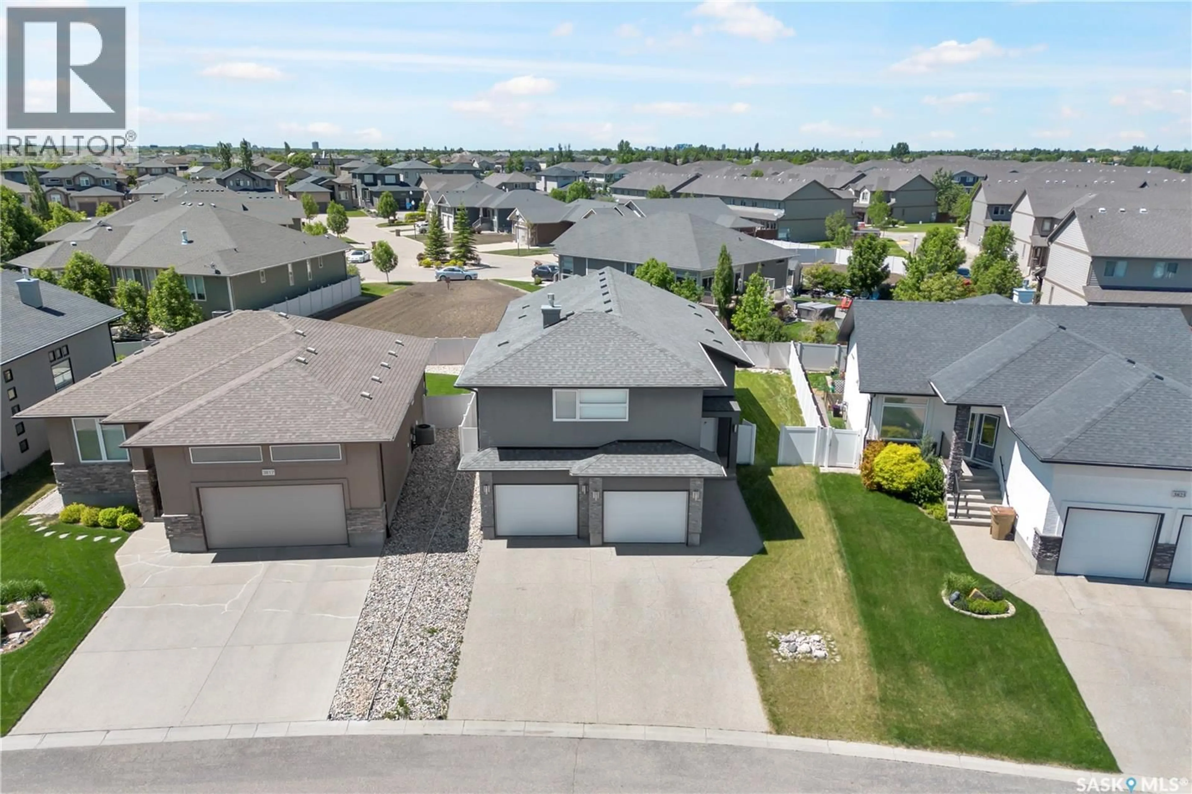A pic from outside/outdoor area/front of a property/back of a property/a pic from drone, street for 3821 GOLDFINCH WAY, Regina Saskatchewan S4V1S4