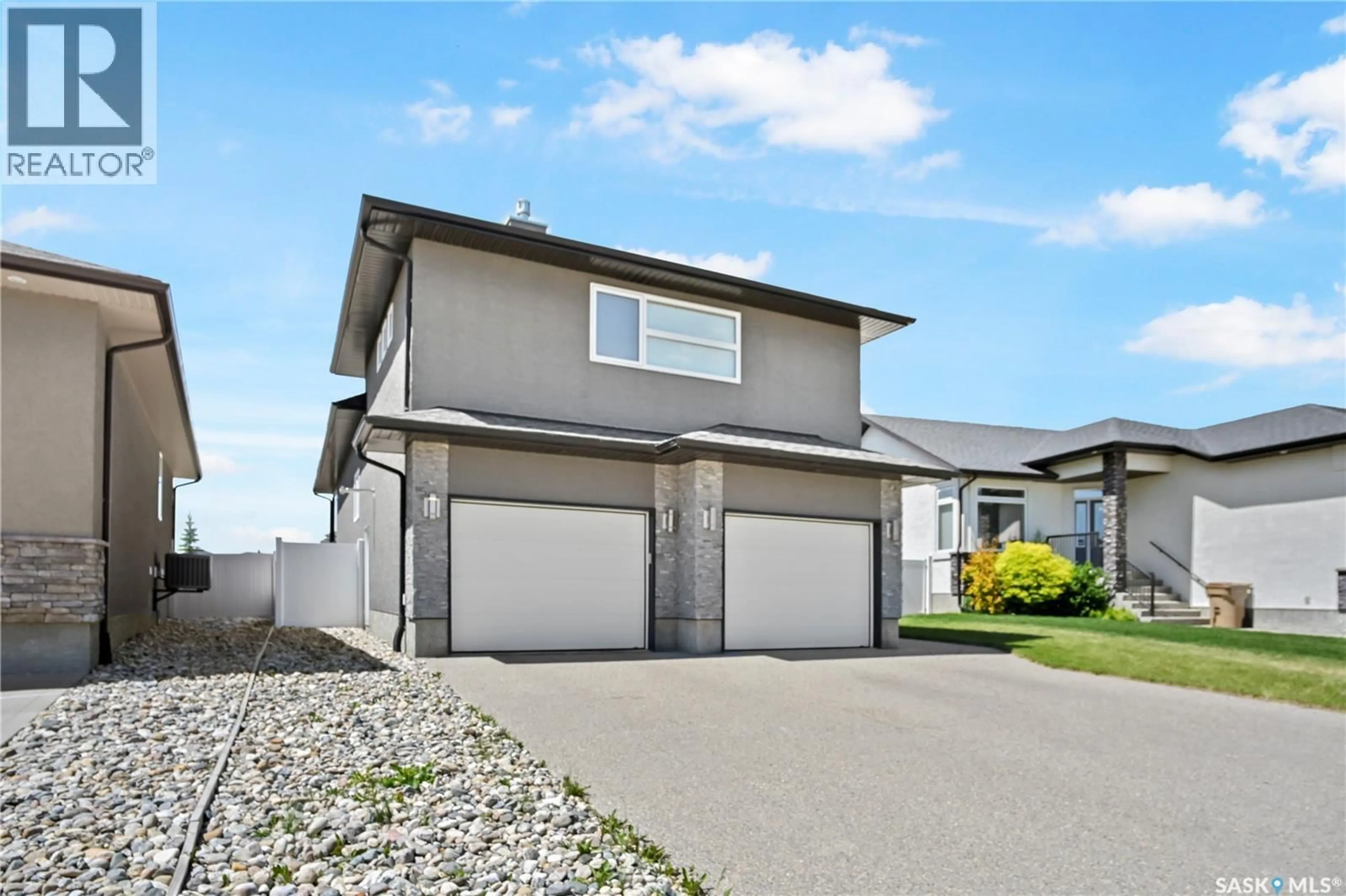 Home with vinyl exterior material, street for 3821 GOLDFINCH WAY, Regina Saskatchewan S4V1S4